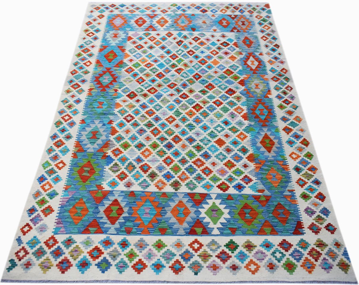 Handwoven Afghan Maimana kilim rug featuring a colorful geometric diamond pattern.