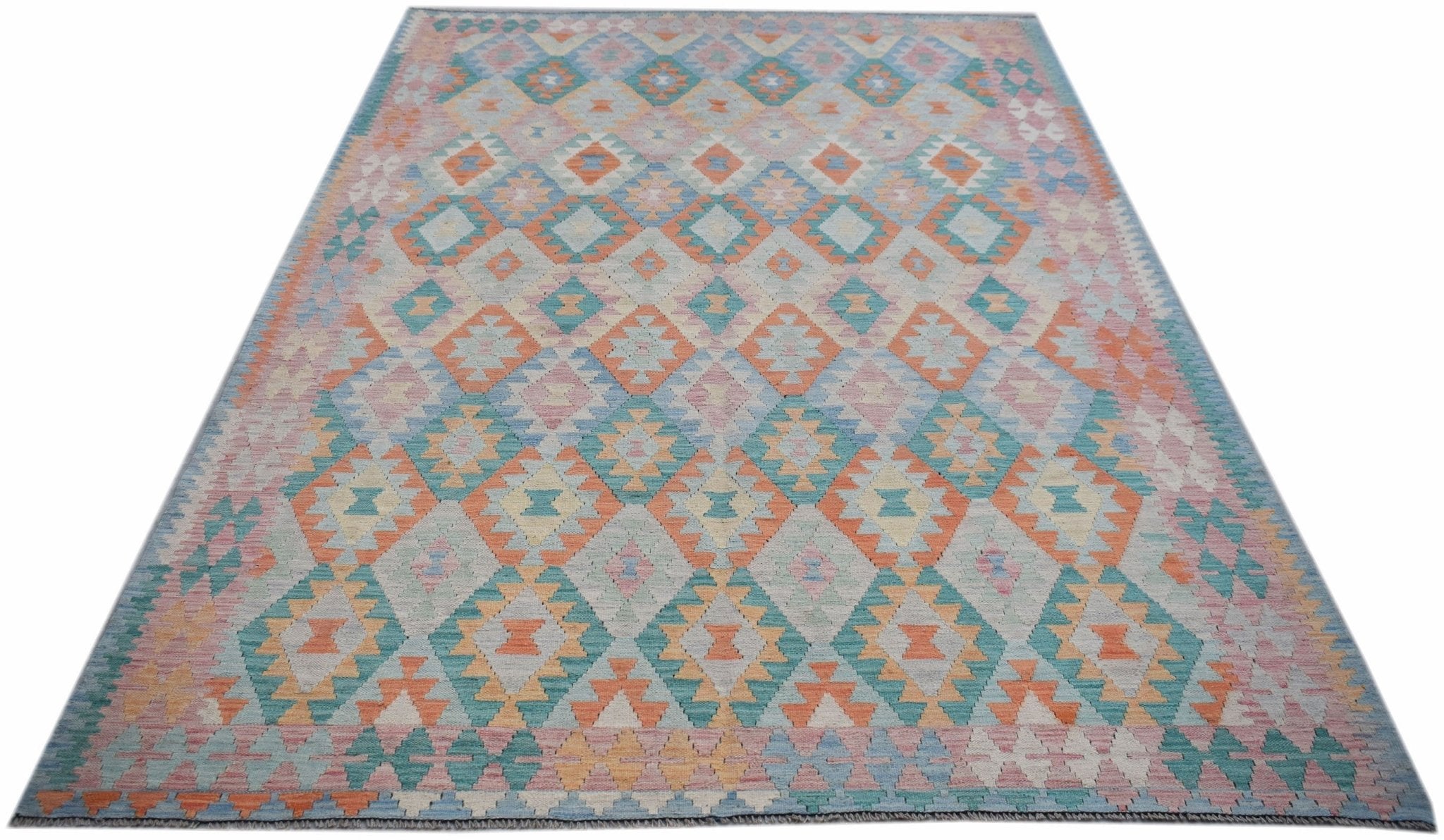 Handwoven Afghan Maimana kilim rug featuring a geometric diamond pattern in soft pastel tones.