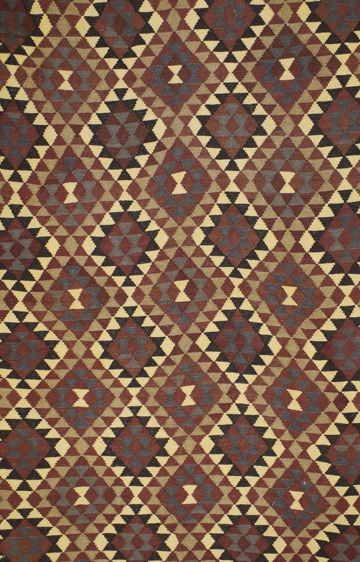 Handmade Afghan Maimana kilim rug featuring a geometric diamond pattern in earthy tones.