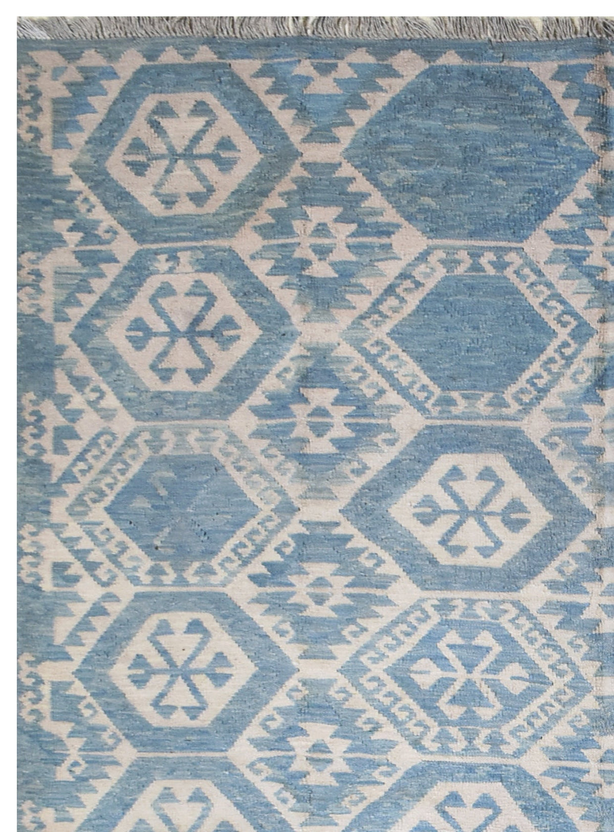 Handmade Afghan Maimana kilim rug featuring a blue and cream geometric hexagonal pattern.