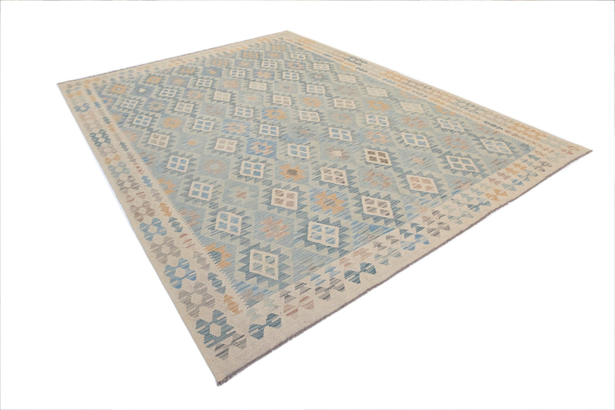 Handwoven Afghan Maimana kilim in soft blue and cream with geometric diamond patterns and a flatweave wool texture.