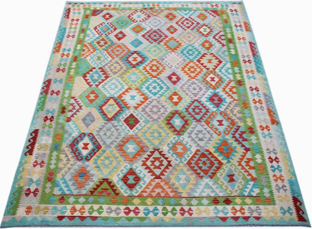 Handwoven Afghan Maimana kilim rug featuring a colorful geometric diamond pattern.