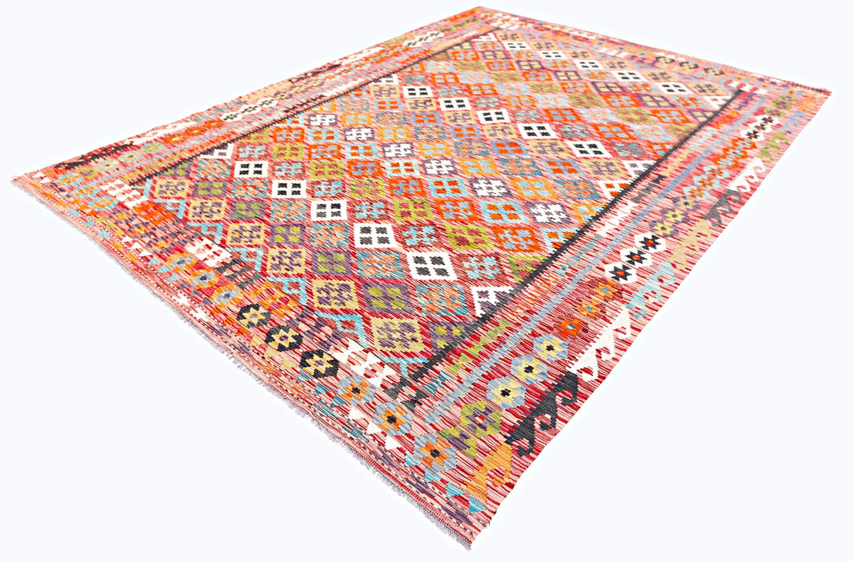 Handwoven Afghan Maimana kilim featuring a colourful geometric diamond pattern in Ghazni wool with a fringed edge.