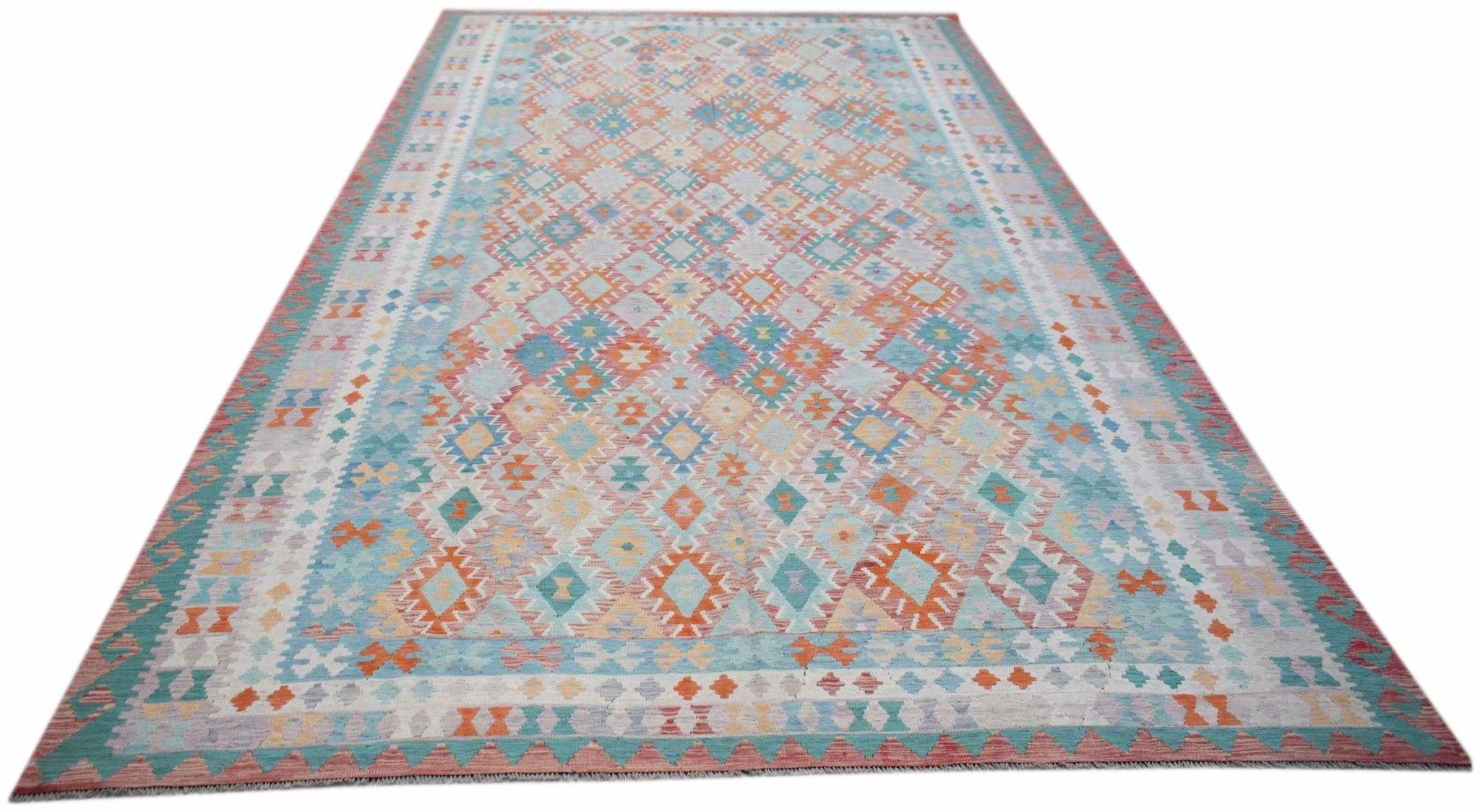 Handwoven Afghan Maimana kilim rug featuring a geometric diamond pattern in soft pastel tones.