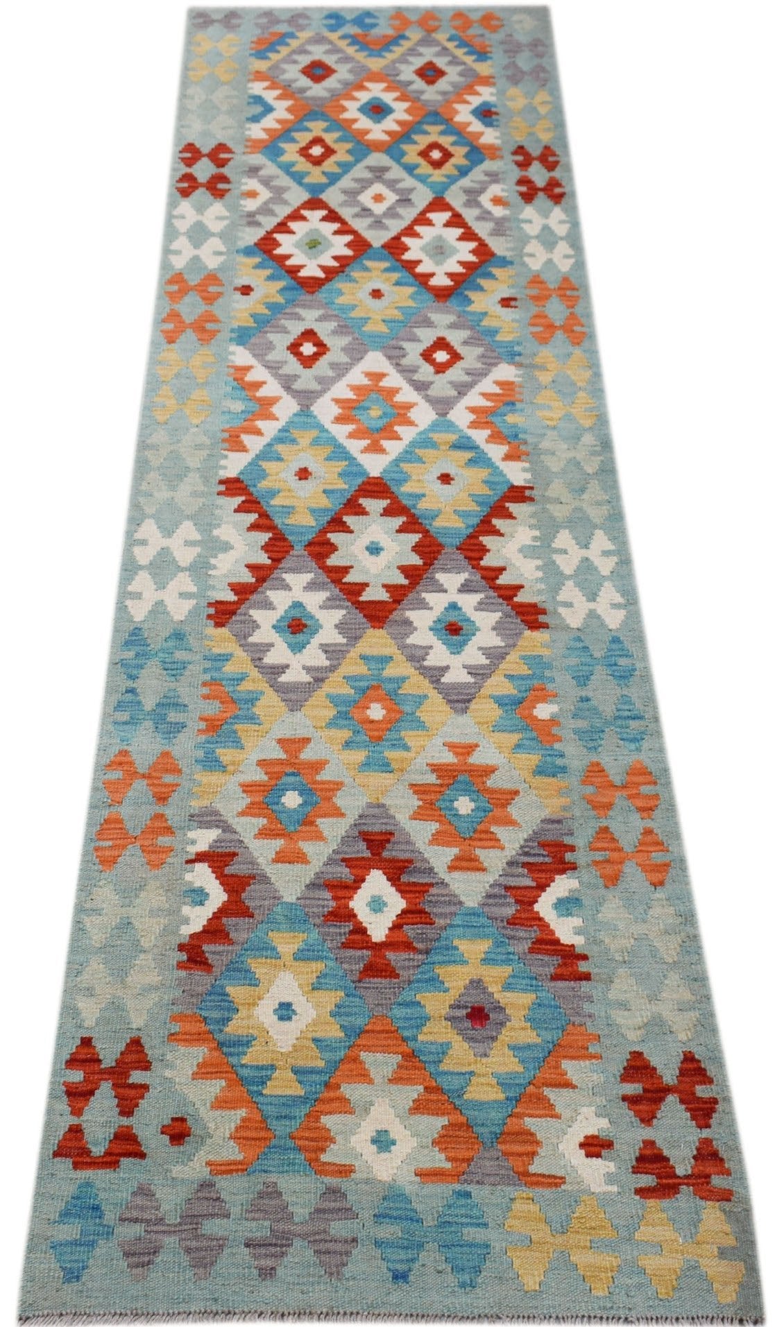Handwoven Afghan Maimana wool runner rug featuring a colorful geometric diamond pattern.