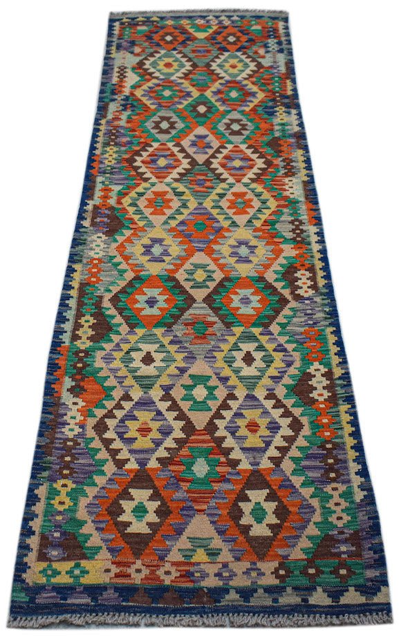 Handwoven Afghan Maimana wool runner featuring a colorful geometric diamond pattern.
