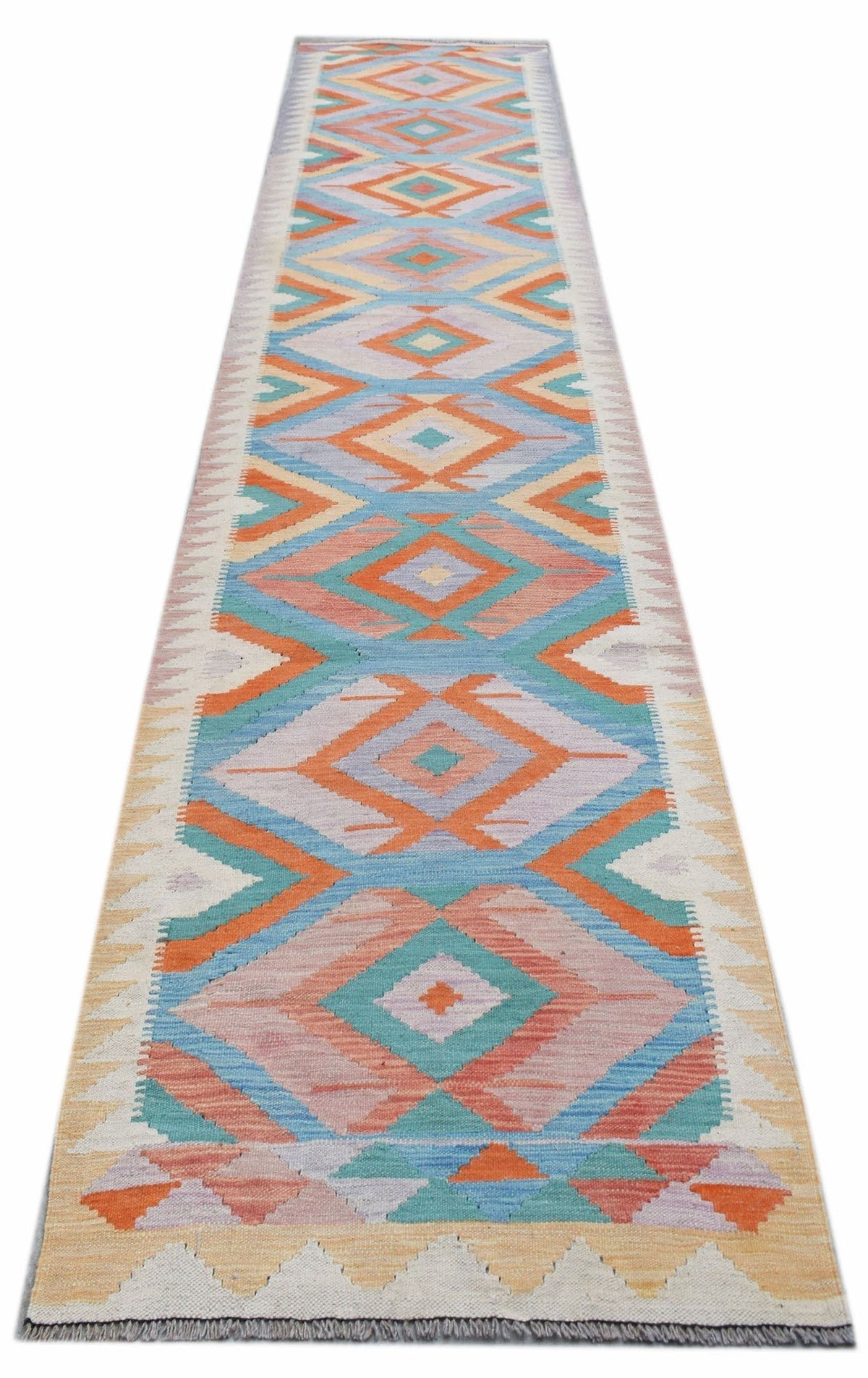 Handwoven Afghan Maimana kilim runner with geometric diamond patterns in soft blue, orange, and cream Ghazni wool.
