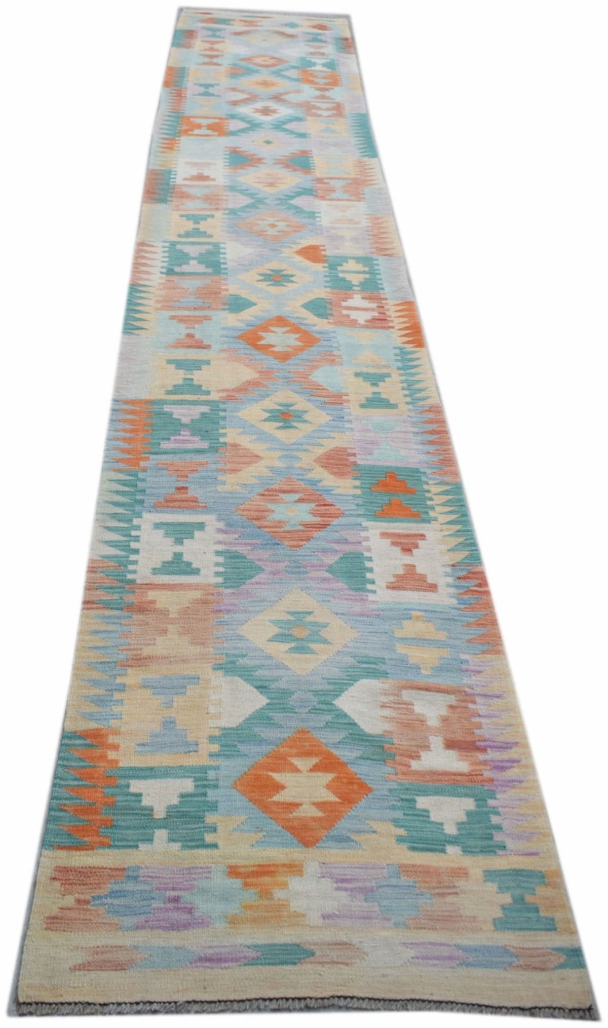 Handwoven Afghan Maimana kilim runner featuring a geometric pattern in soft pastel tones of orange, blue, and cream.