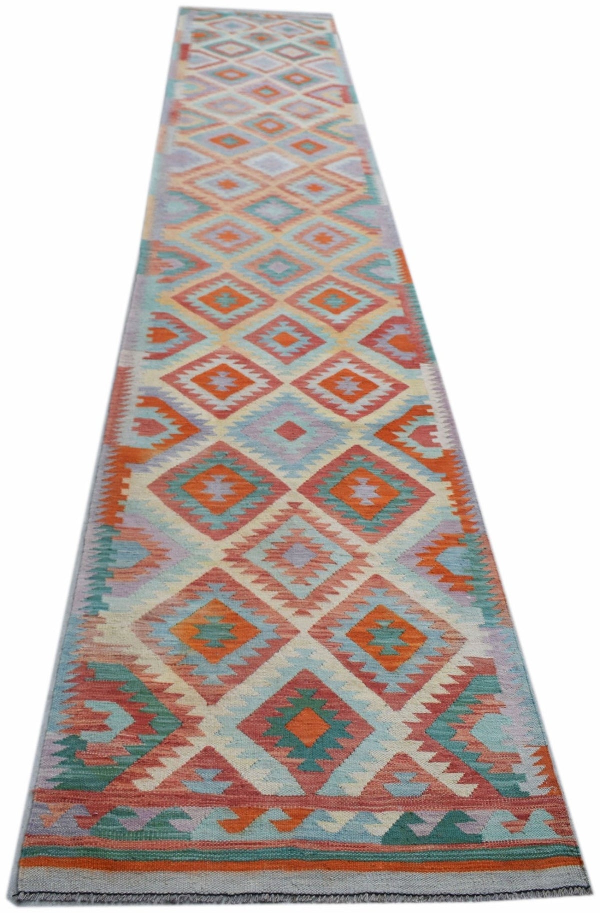 Handwoven Afghan Maimana kilim runner featuring a repeating geometric diamond pattern in vibrant orange, teal, and cream.