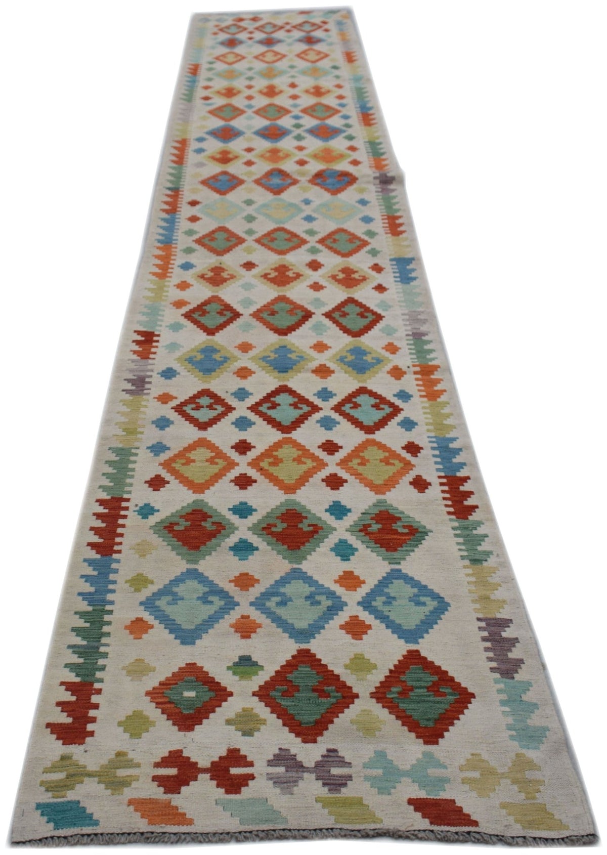 Handwoven Afghan Maimana wool runner featuring a colorful geometric diamond pattern.
