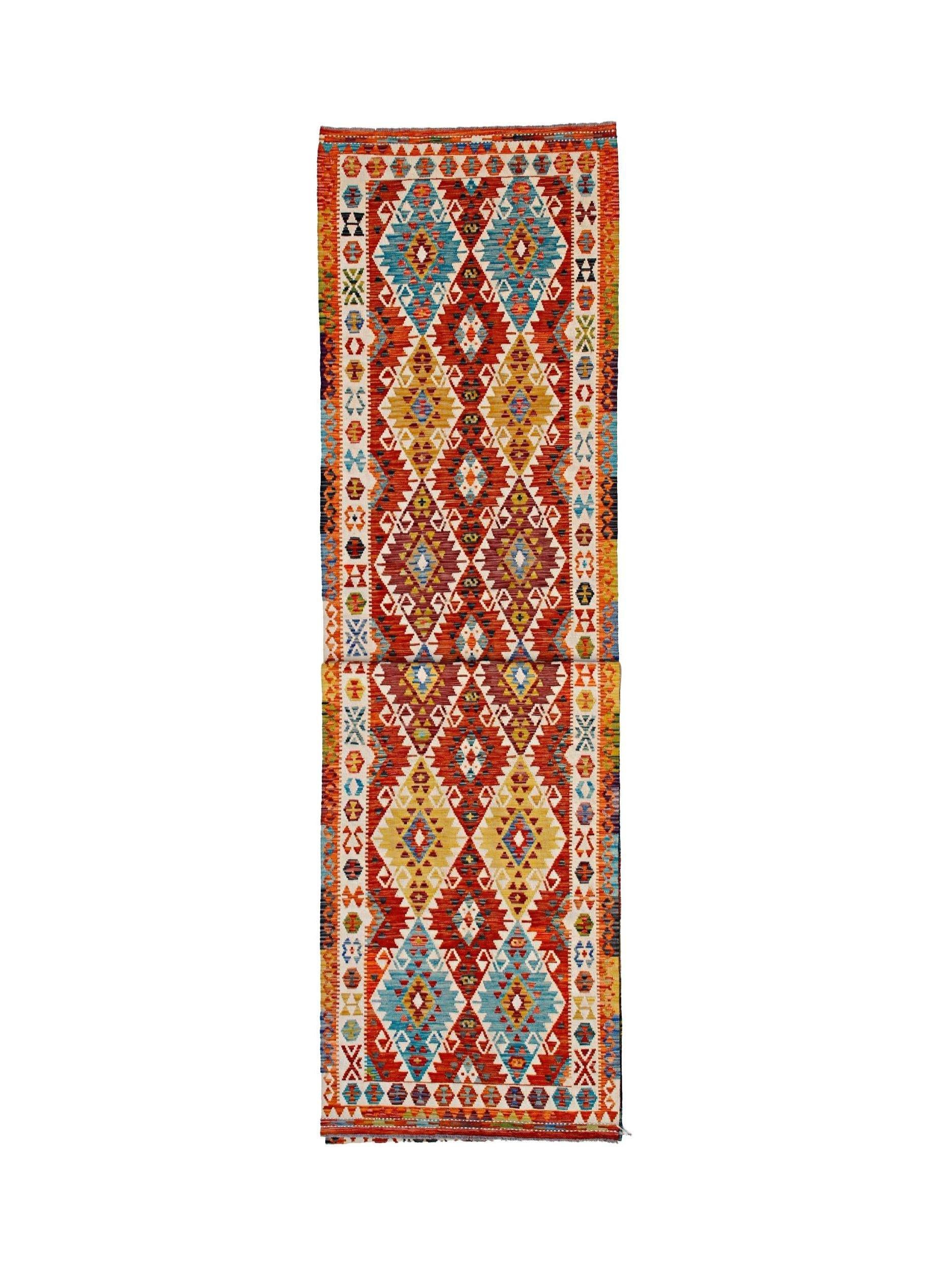 Handwoven Afghan Maimana wool runner featuring a vibrant geometric diamond pattern.