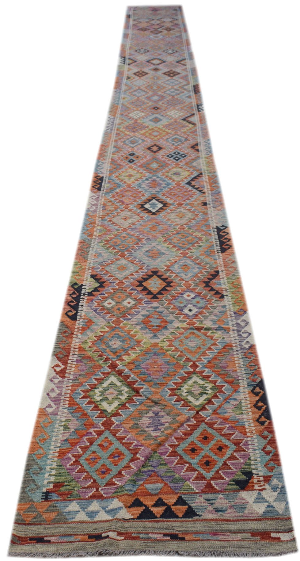 Handwoven Afghan Maimana wool runner featuring a colorful geometric diamond pattern.
