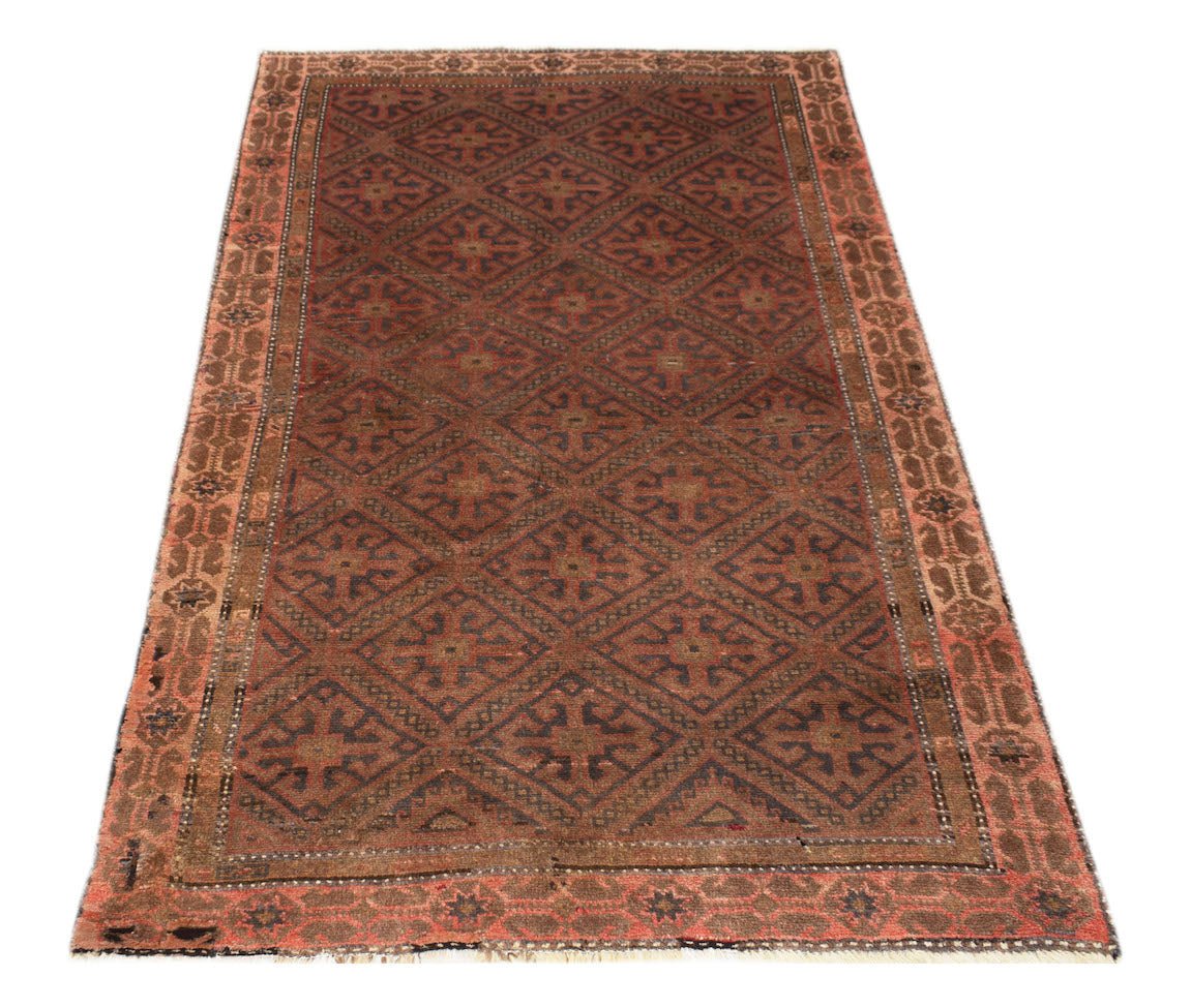 Handmade Afghan Pashm rug featuring a repeating diamond pattern in shades of red, brown, and blue.
