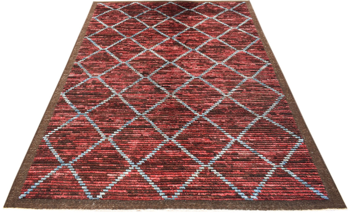 Hand-knotted Afghan Yekta rug with a red and brown diamond pattern and textured wool pile on a flatweave base.