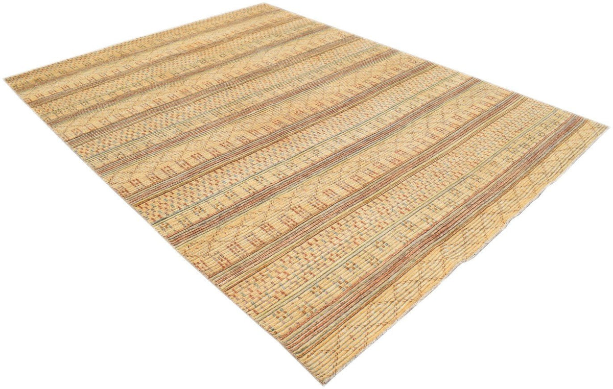 An Afghan Yekta rug featuring a textured, striped pattern in warm beige and earthy tones.