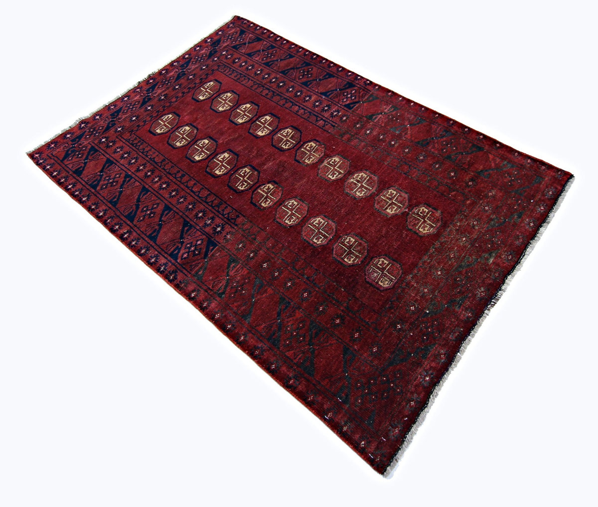Antique Turkmen Mauri rug featuring deep red tones, geometric octagonal gul motifs, and a fine, detailed weave.