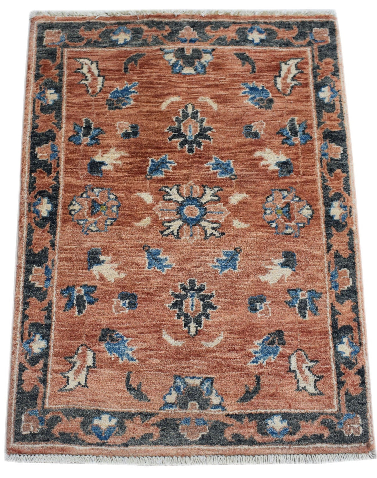 Hand-knotted mini Afghan Chobi rug in terracotta, blue and cream with a detailed floral pattern and white fringe.
