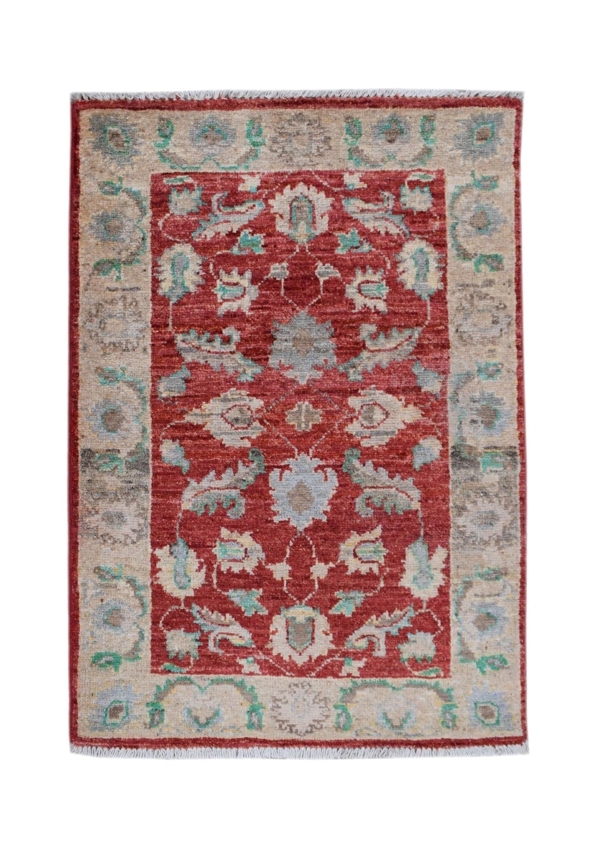 Hand-knotted mini Afghan Chobi rug featuring a red field, intricate floral motifs, and a cream border with short fringe.