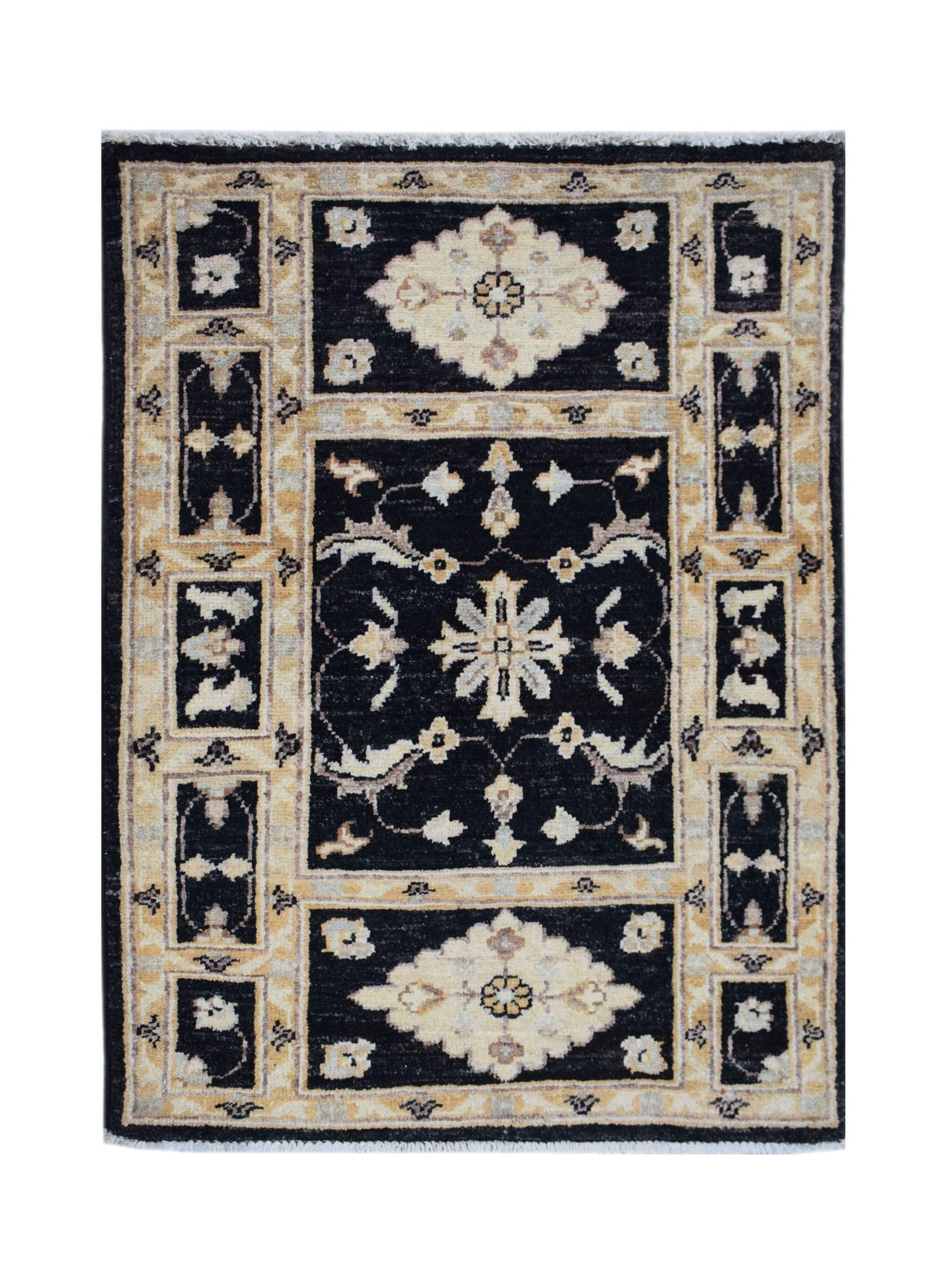 Hand-knotted Afghan Chobi rug with a black field, cream floral motifs, and a detailed border with short white fringe.