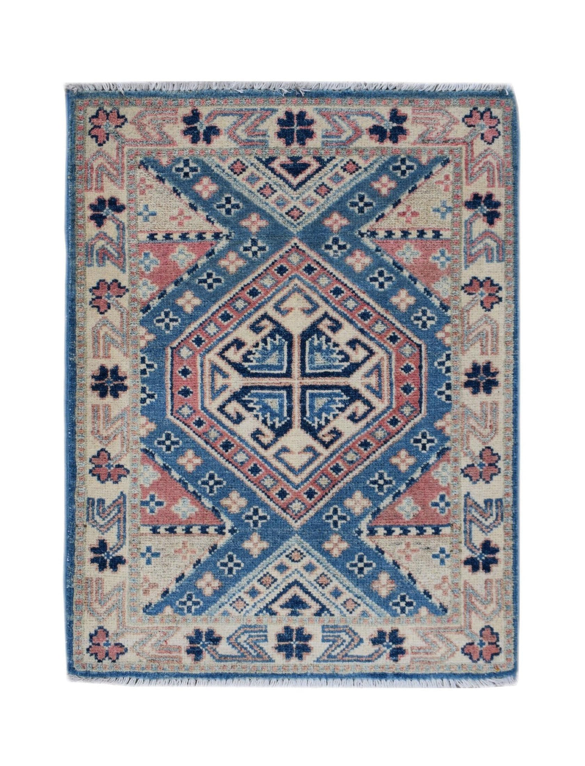 Hand-knotted mini Afghan Kazakh rug featuring geometric blue and pink tribal patterns on a cream wool background with fringe.