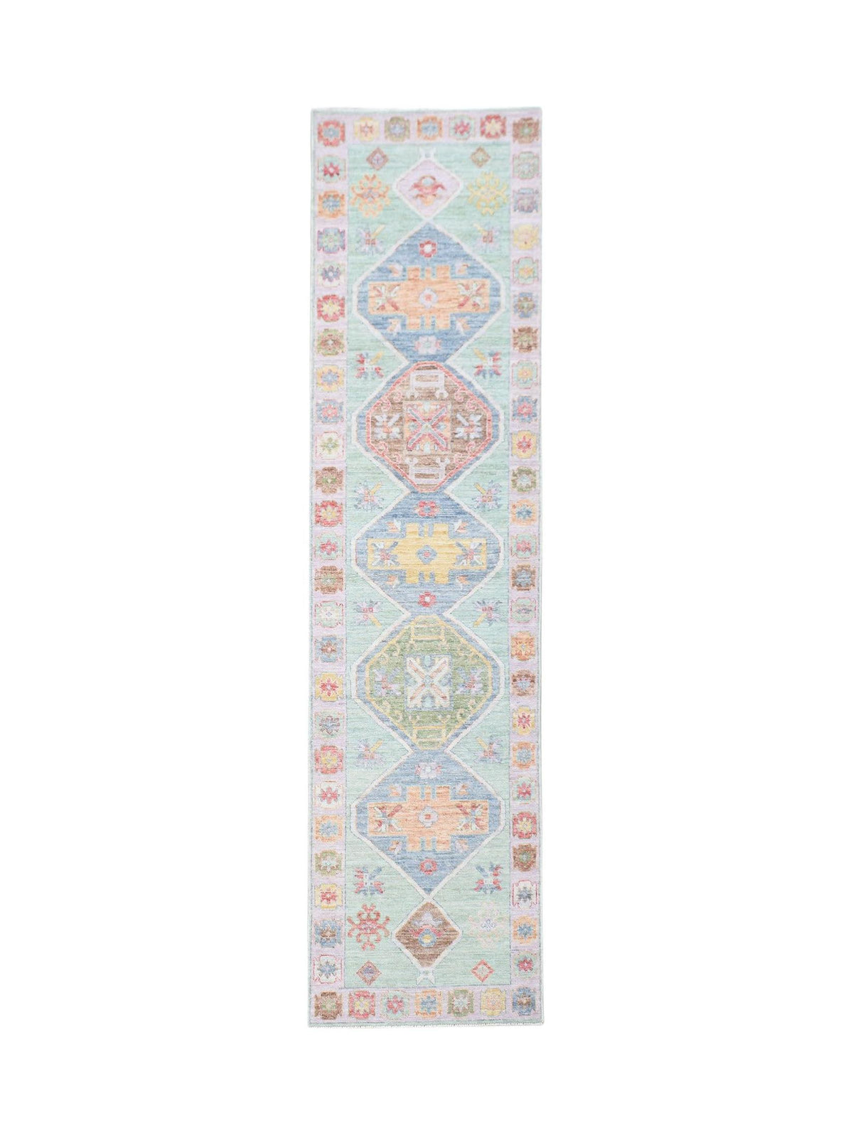 Hand-knotted transitional Oushak runner featuring pastel medallions and geometric motifs on a soft mint green field.