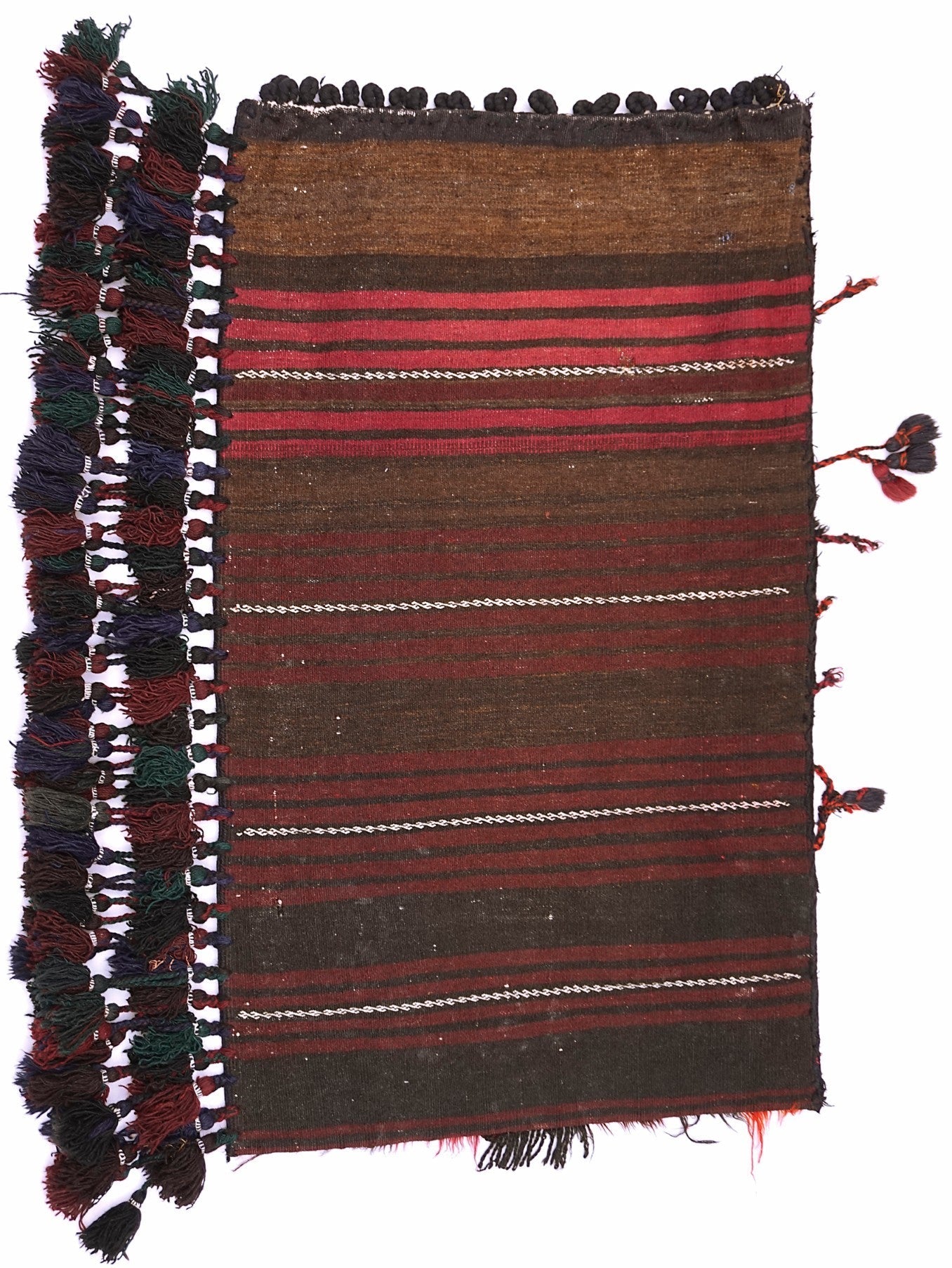 A handmade vintage Afghan Baluch wool cushion featuring striped patterns and decorative tassels.