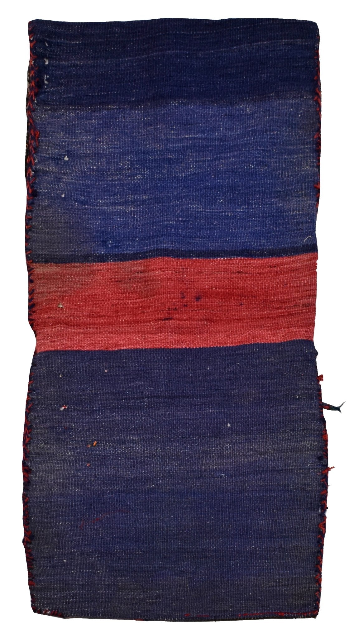 A vintage handmade Afghan wool saddle bag featuring horizontal blue and red stripes.