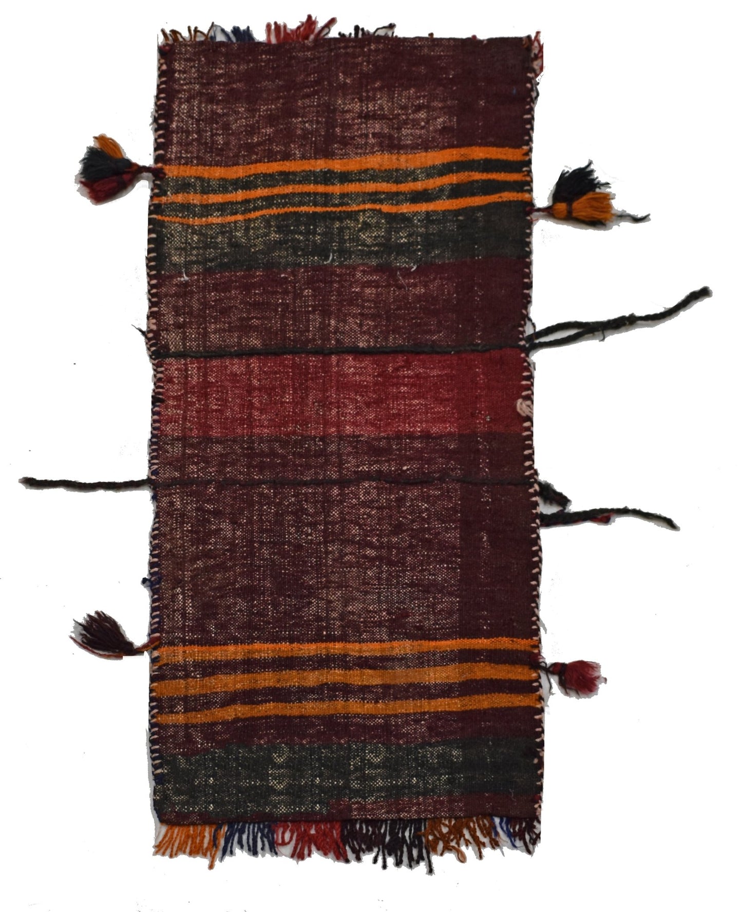 A vintage handmade Afghan wool saddle bag featuring horizontal stripes and decorative tassels.