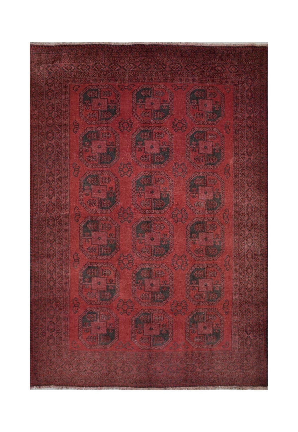 A vintage handmade Afghan Turkmen rug featuring a repeating geometric octagonal pattern in red.