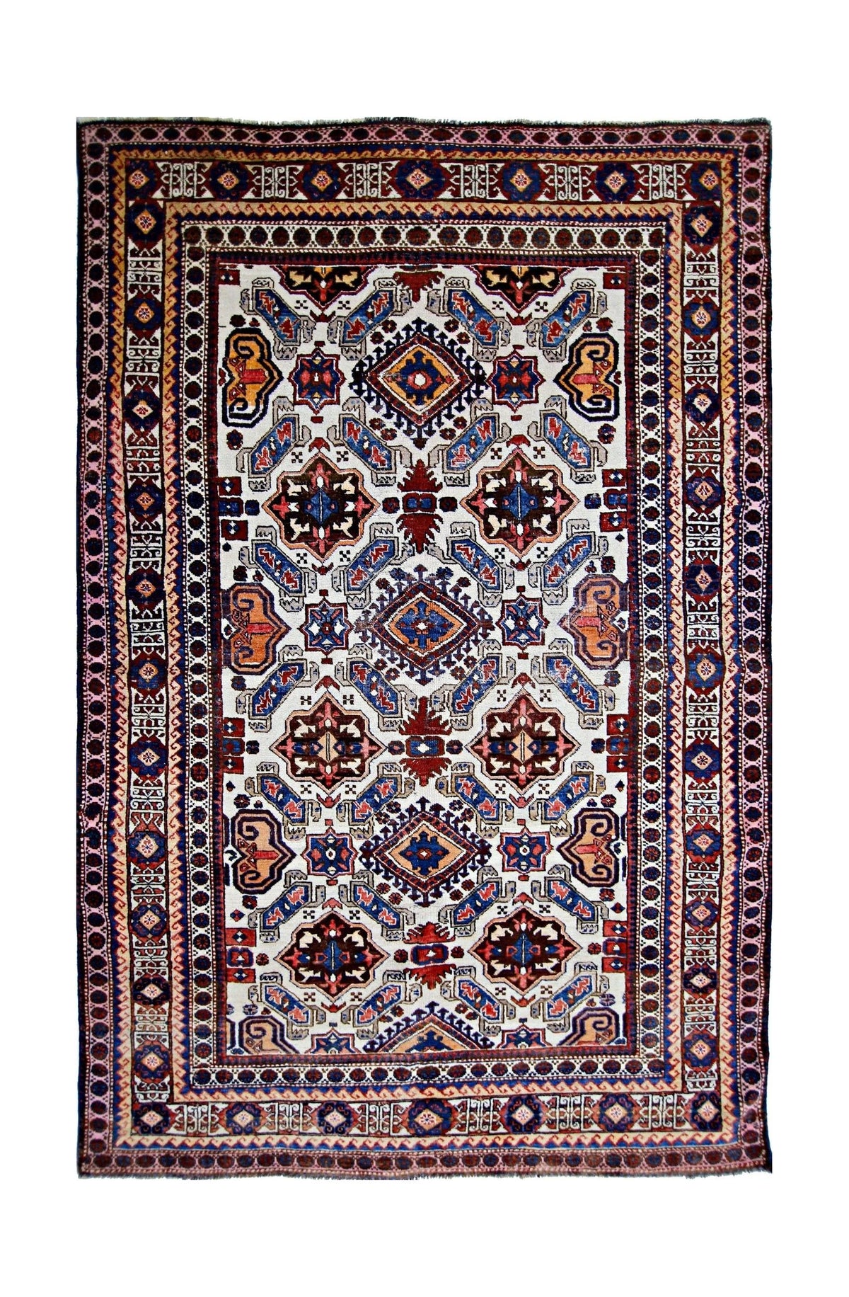 Vintage Caucasian Shirvan rug with intricate red, blue, and cream geometric medallions and detailed floral borders.