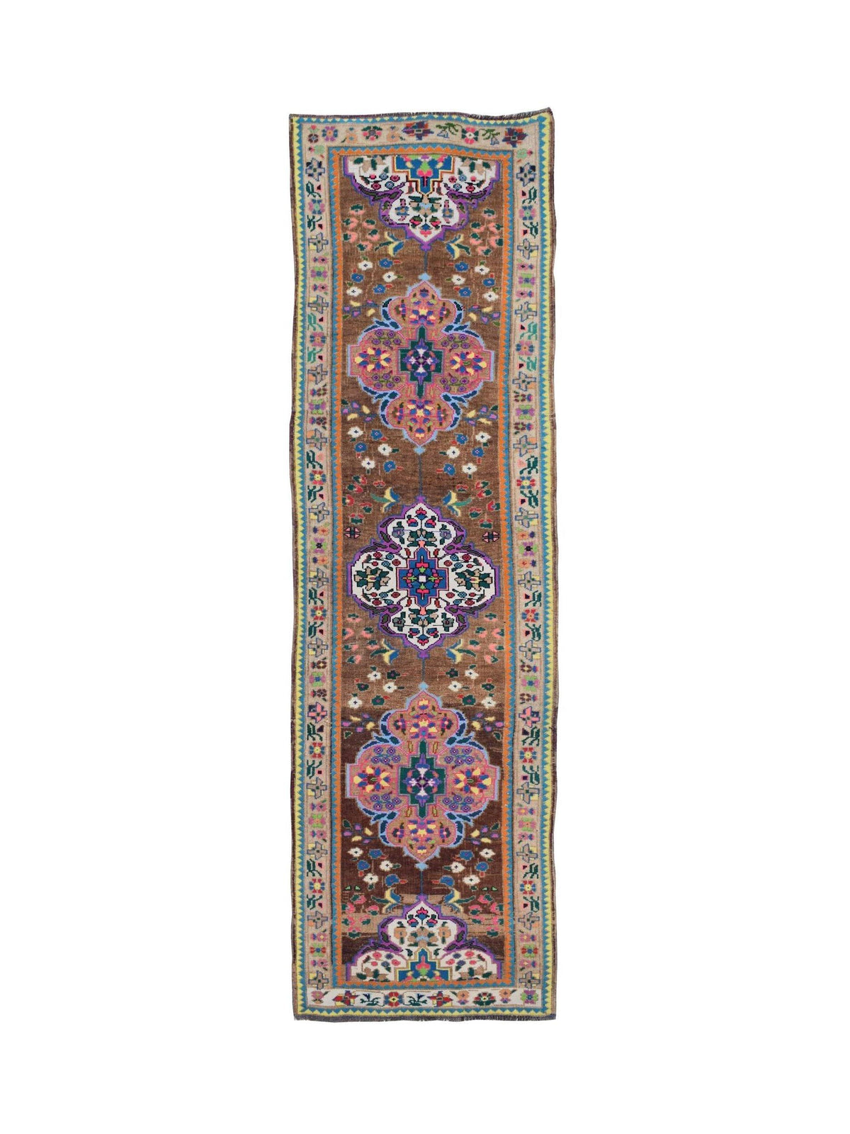 Vintage Kurdish Herki runner with a brown field, geometric medallions, and vibrant multicoloured tribal motifs.