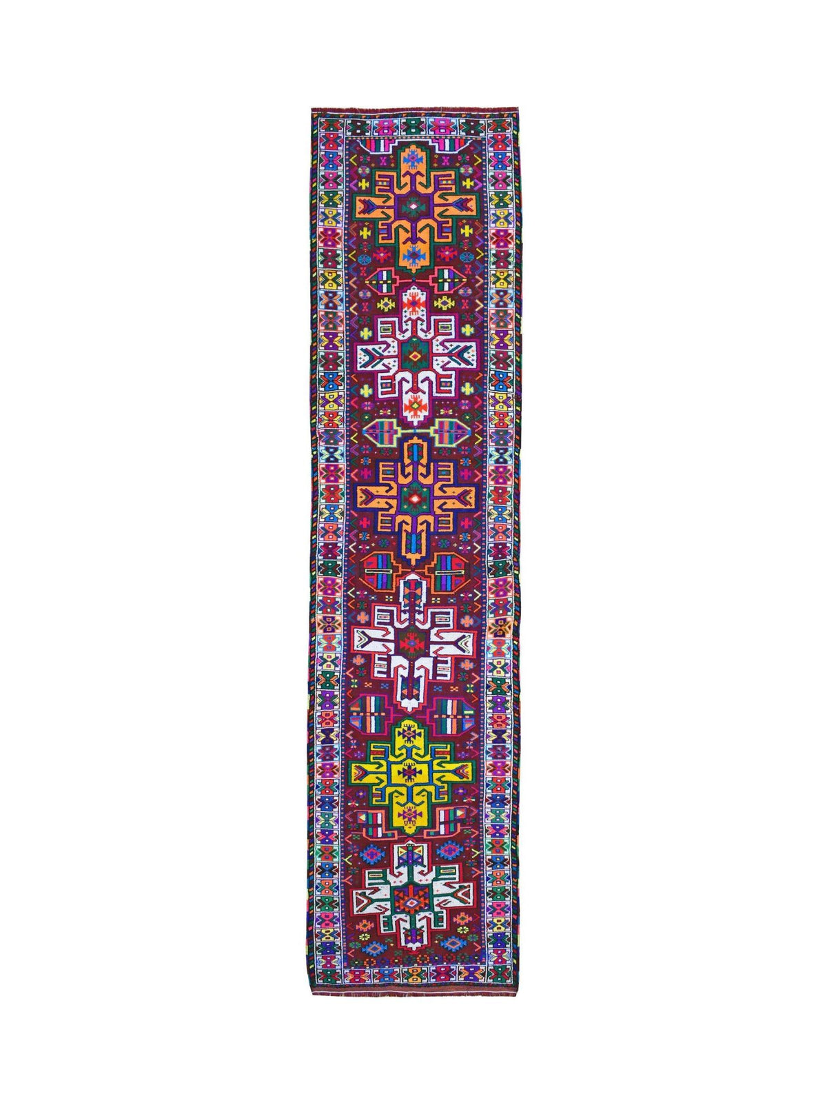 Vintage Kurdish Herki runner with bold geometric medallions and vibrant tribal patterns in a deep red wool pile.