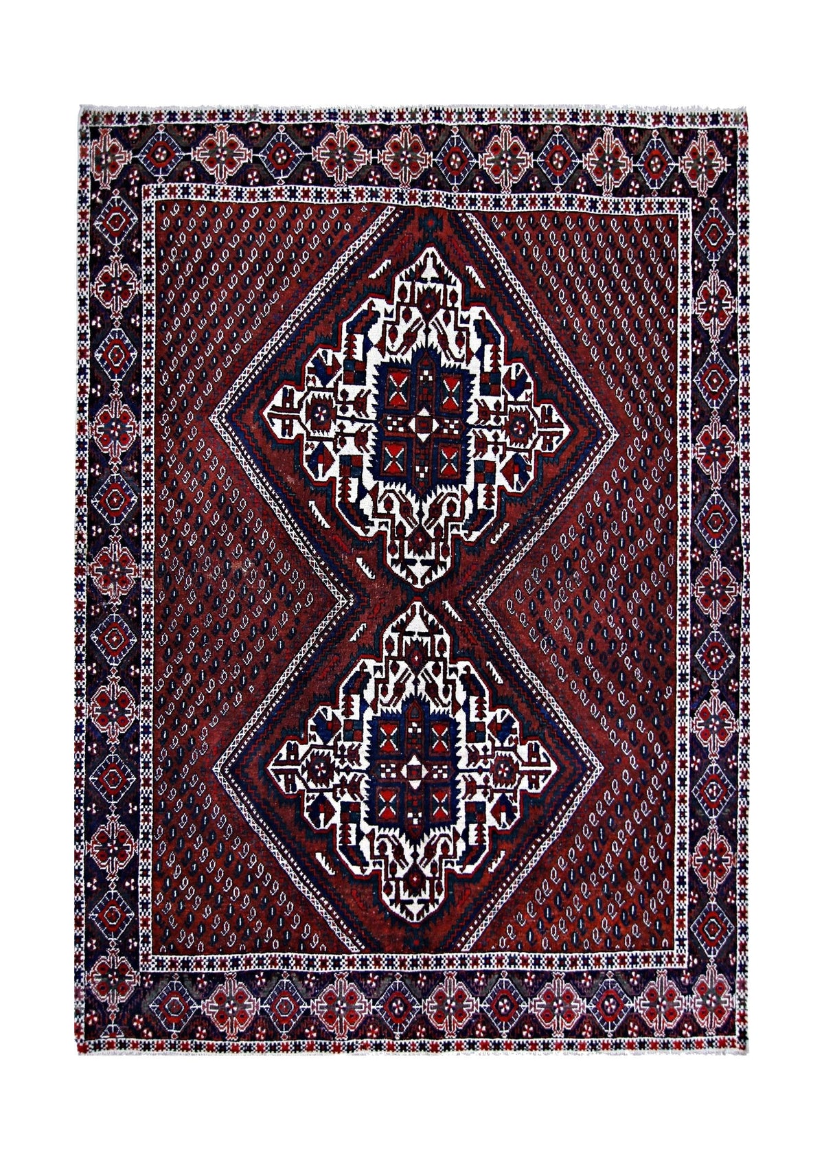 Vintage Persian Afshar rug with a deep red field, geometric white medallions, and intricate navy blue floral borders.