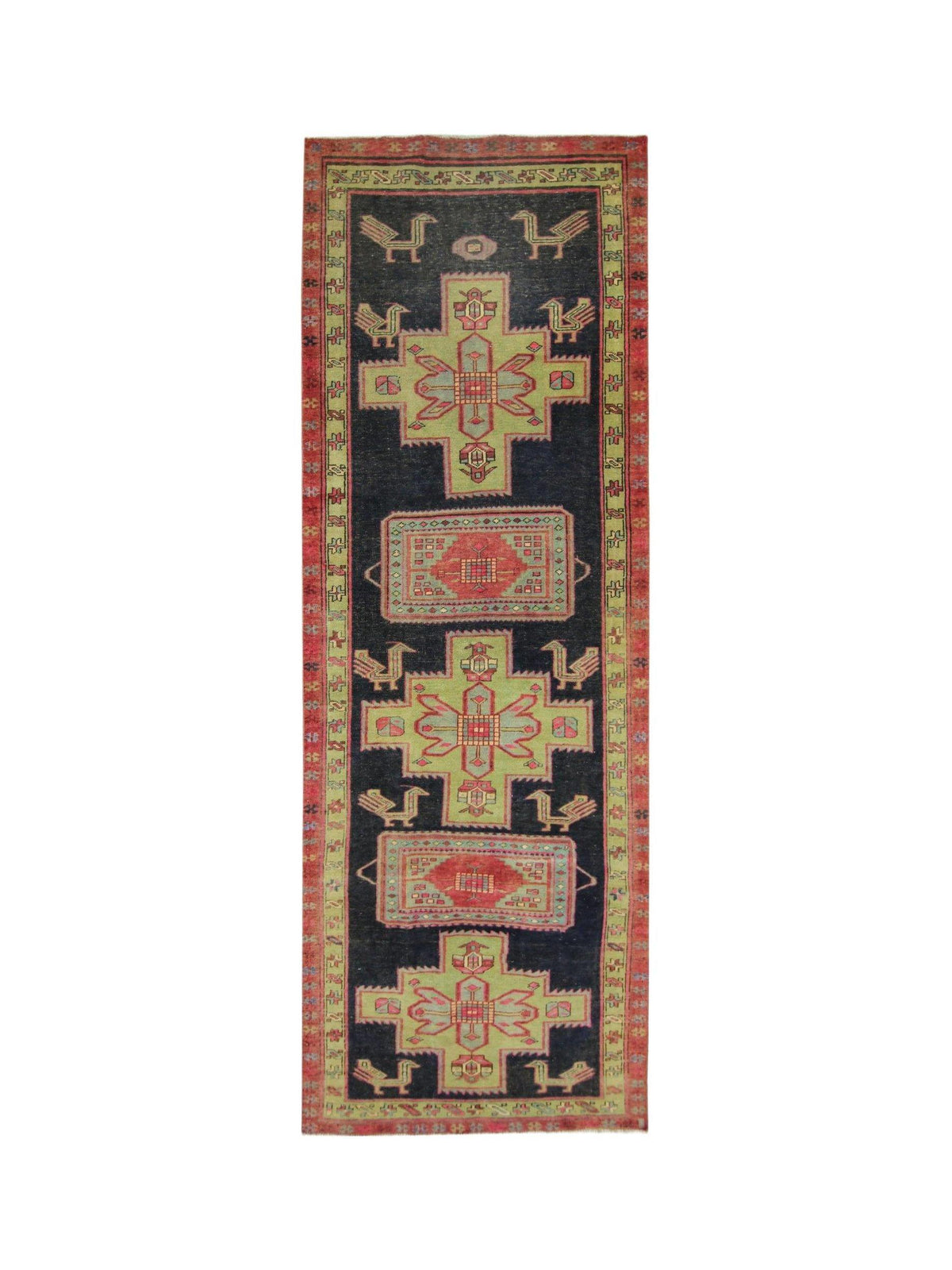 Vintage Persian Ardabil wool runner featuring geometric motifs, stylized birds, and a dark field with red and green accents.