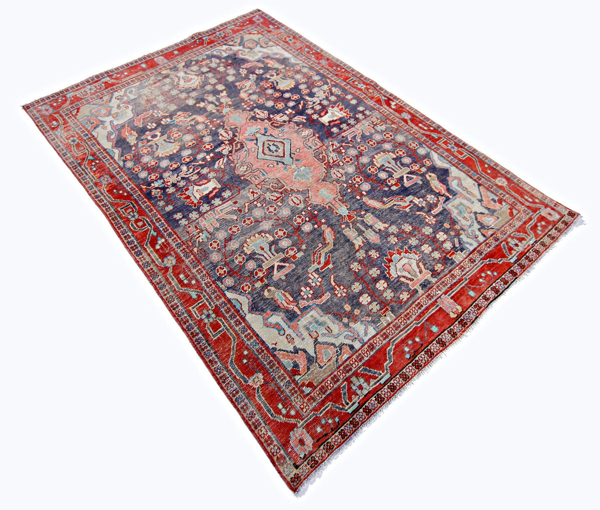 Vintage Persian Bakhtiari rug with a red border and navy blue field featuring intricate floral and garden panel motifs.