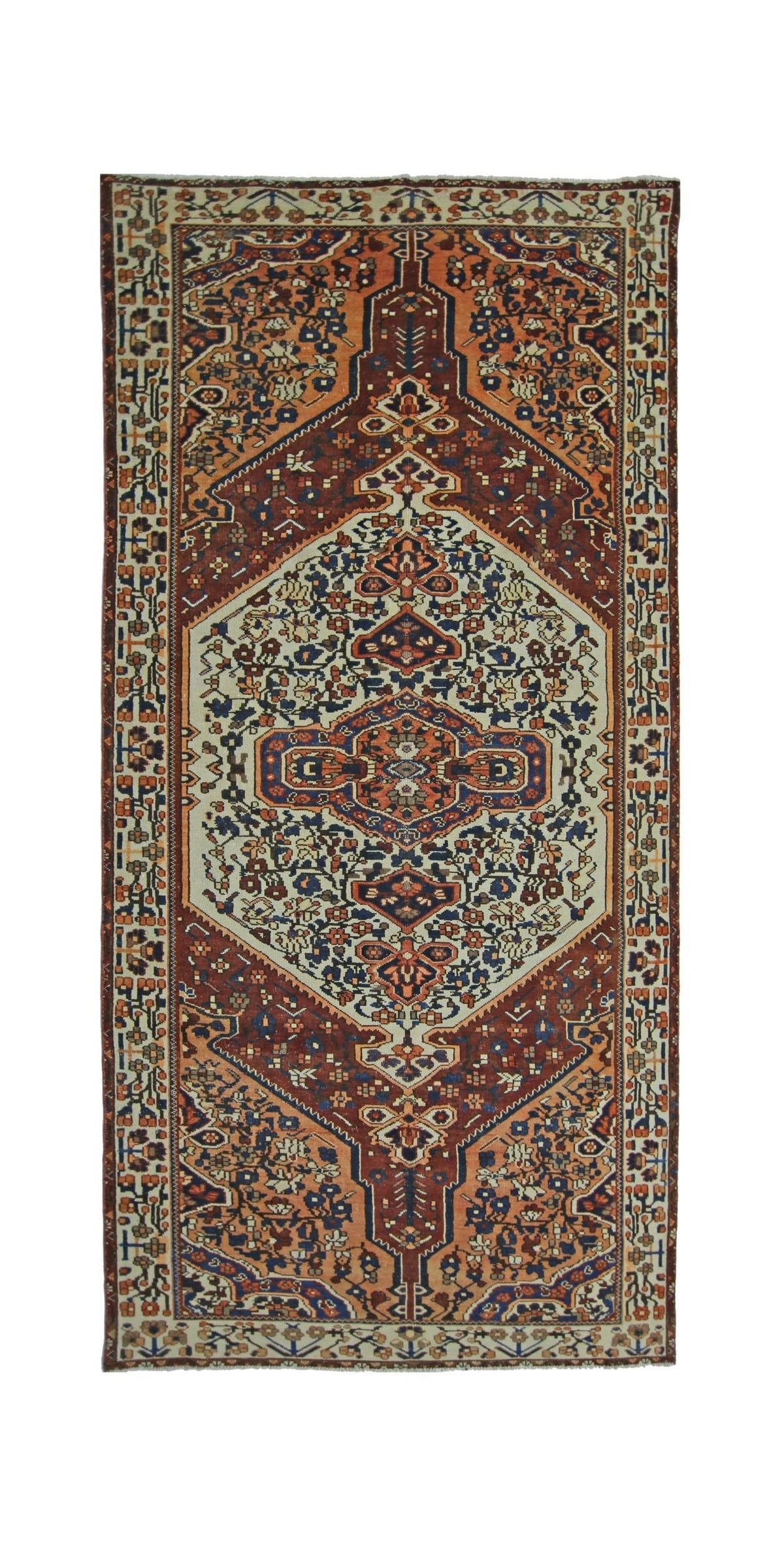 Vintage Persian Bakhtiari rug featuring a central diamond medallion with intricate floral motifs in rust, navy, and cream.