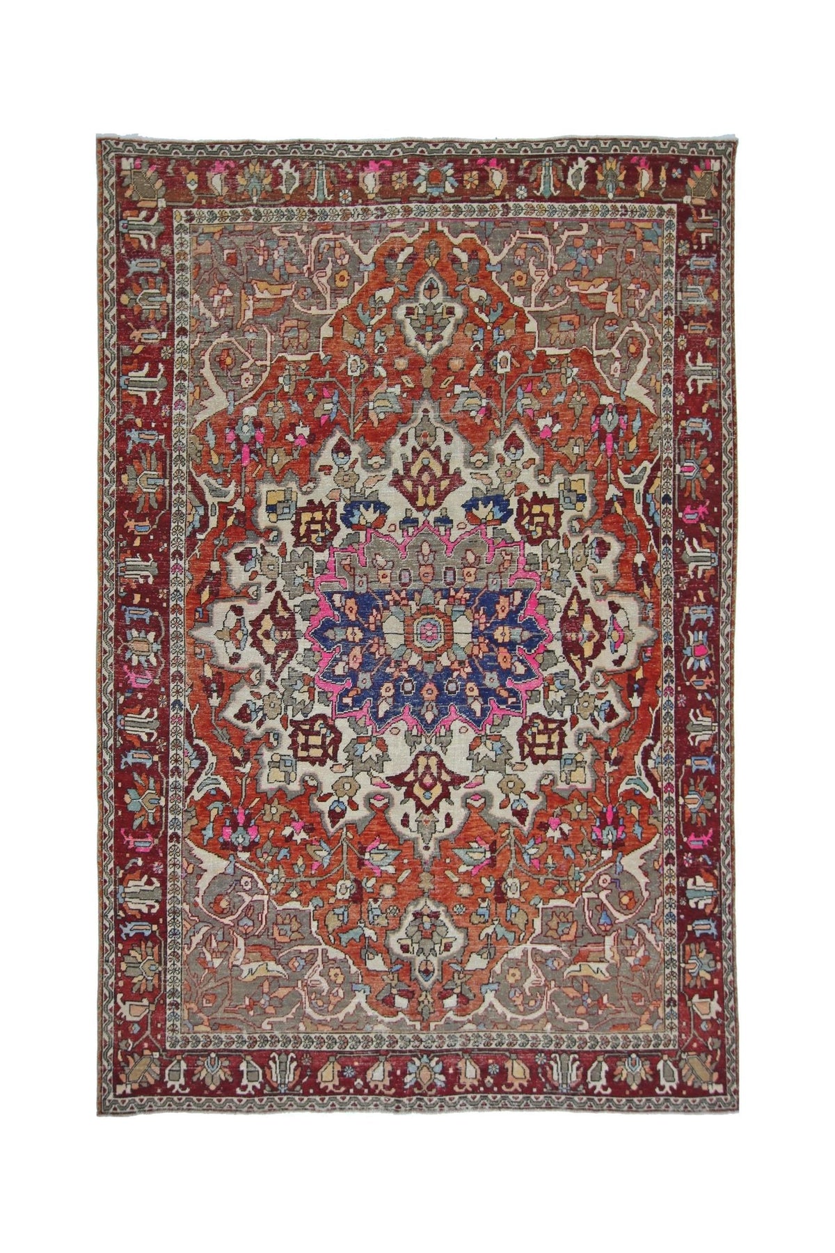 Vintage Persian Bakhtiari rug featuring a central floral medallion in red, blue, and cream with a detailed border.
