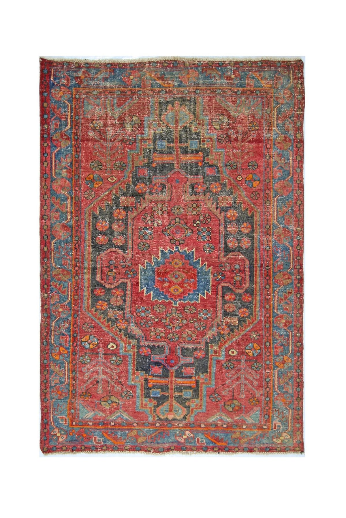 A vintage handmade Persian Hamadan rug featuring a central geometric medallion on a red field.