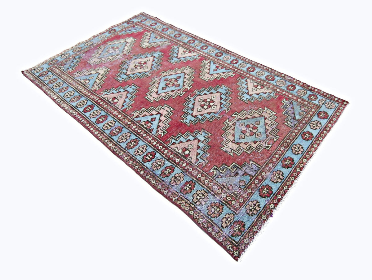 Hand-knotted vintage Hamadan rug in red and blue with a central diamond medallion pattern and decorative floral borders.