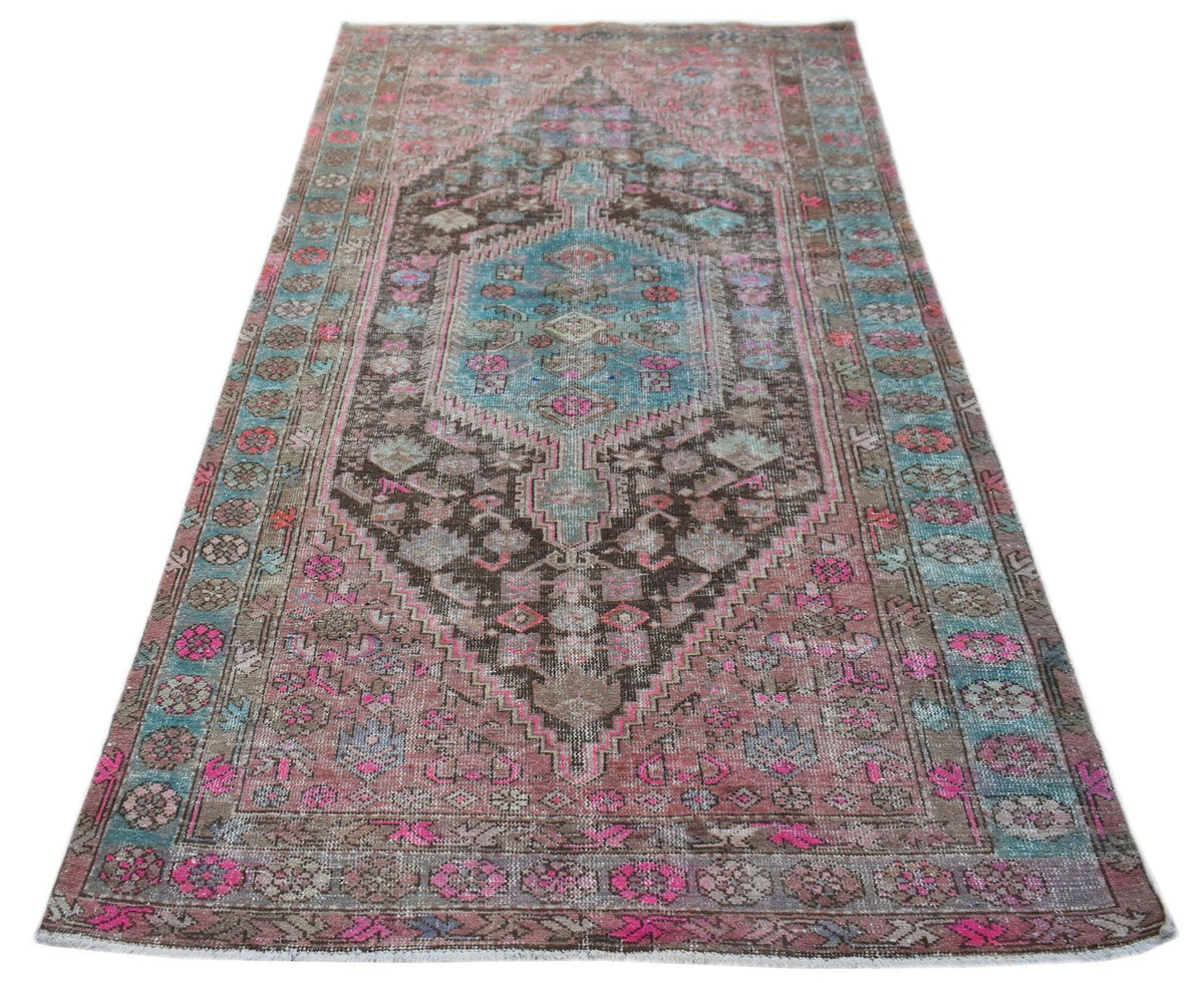 Hand-knotted vintage Hamadan rug featuring a central diamond medallion in teal, brown, and pink with intricate floral motifs.
