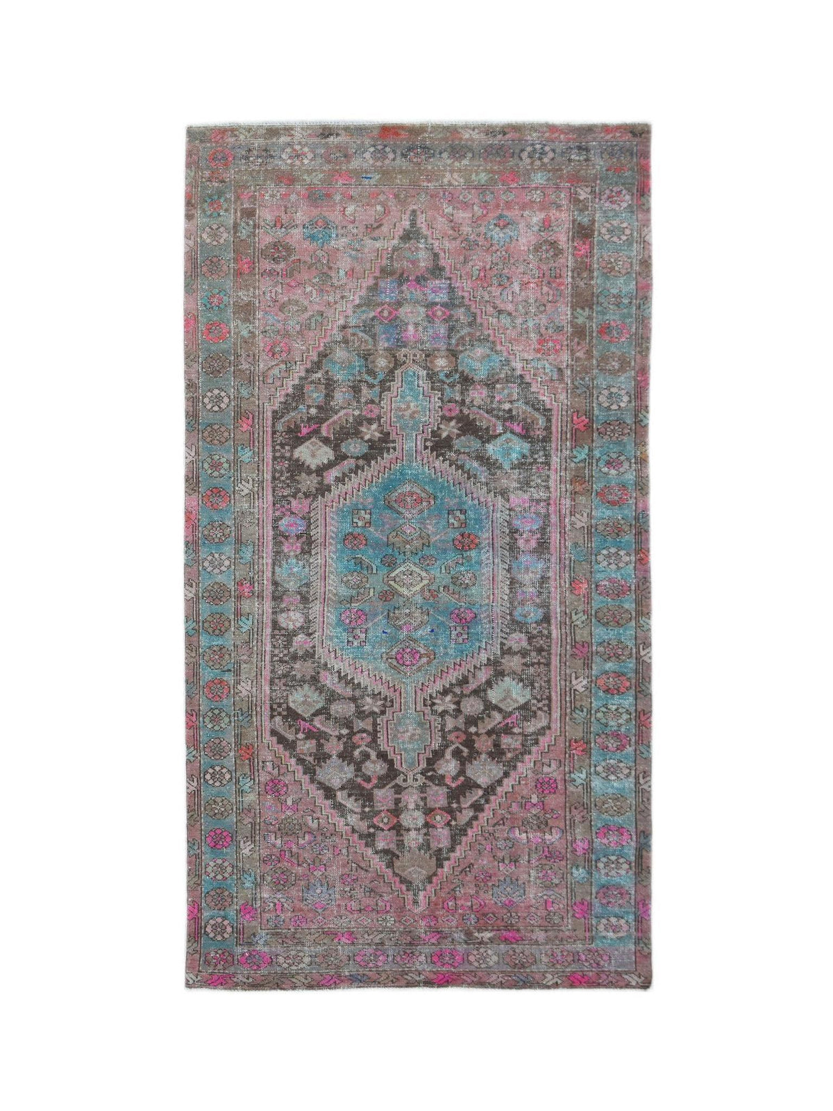 Hand-knotted vintage Persian Hamadan rug featuring a central blue and brown hexagonal medallion on a faded pink floral field.