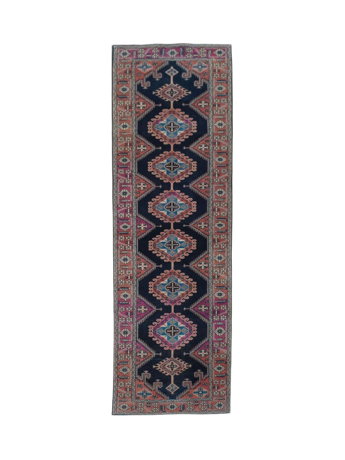 Hand-knotted wool Hamadan runner featuring a navy field with repeating pink and blue diamond medallions and floral borders.