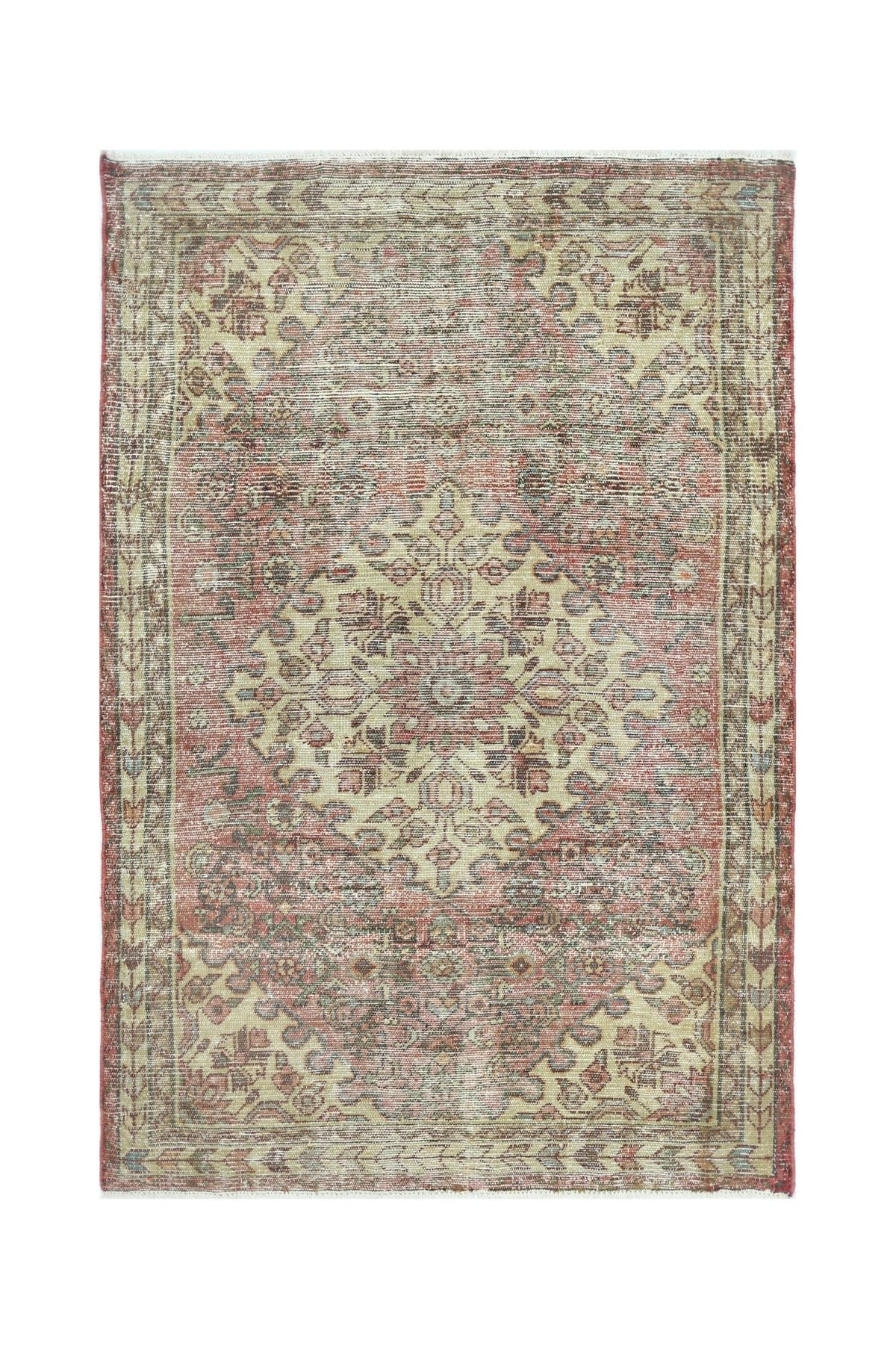 A vintage Persian rug featuring a central medallion pattern in muted red and beige tones.