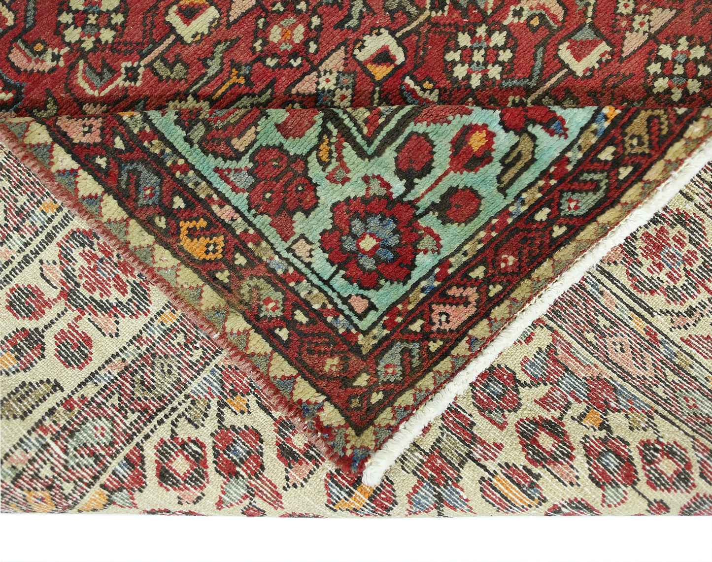 A vintage Persian Hossainabad runner featuring intricate floral patterns in red and teal.