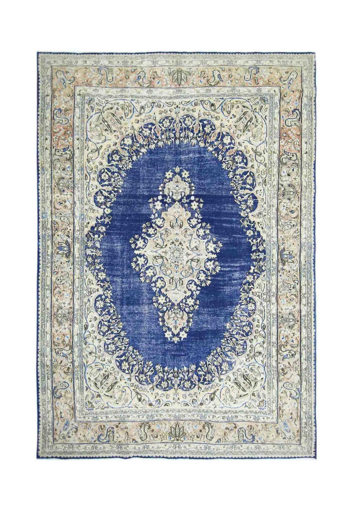 Vintage Persian Kerman rug with a deep blue central medallion, intricate floral patterns, and a cream border.