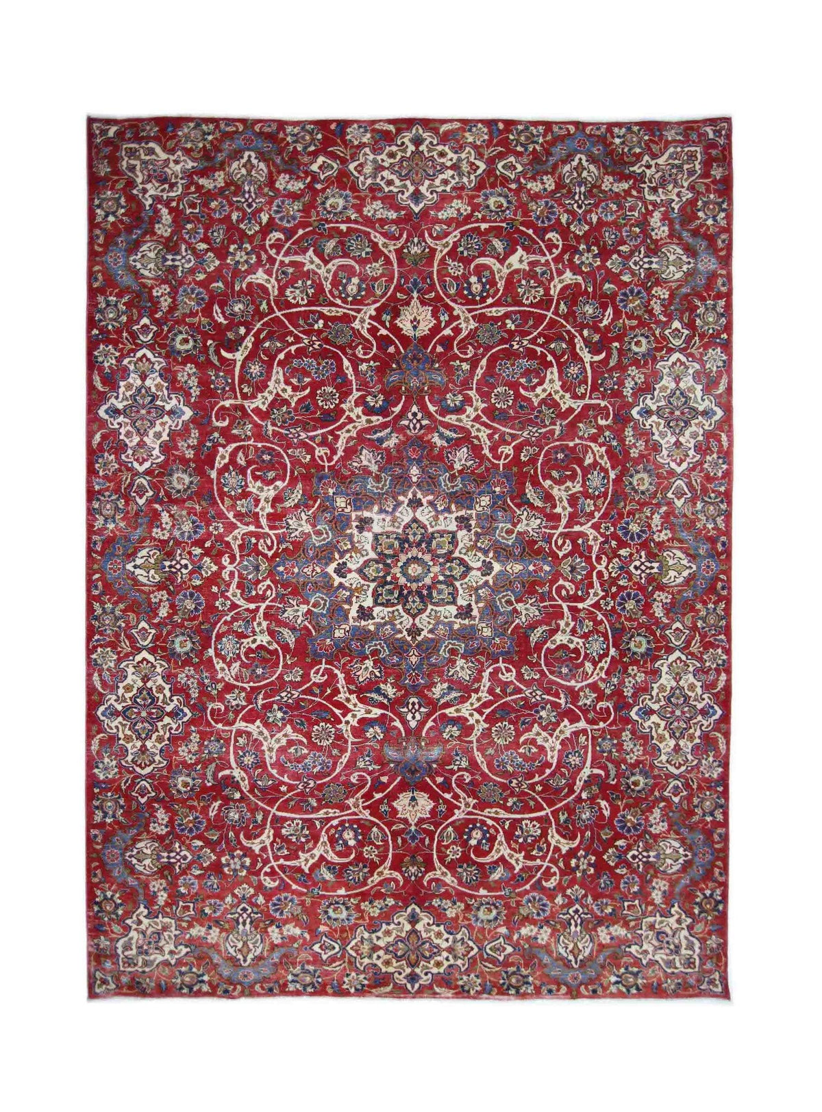 Hand-knotted vintage Persian Kerman rug featuring an intricate floral pattern and central medallion in red, blue, and cream.