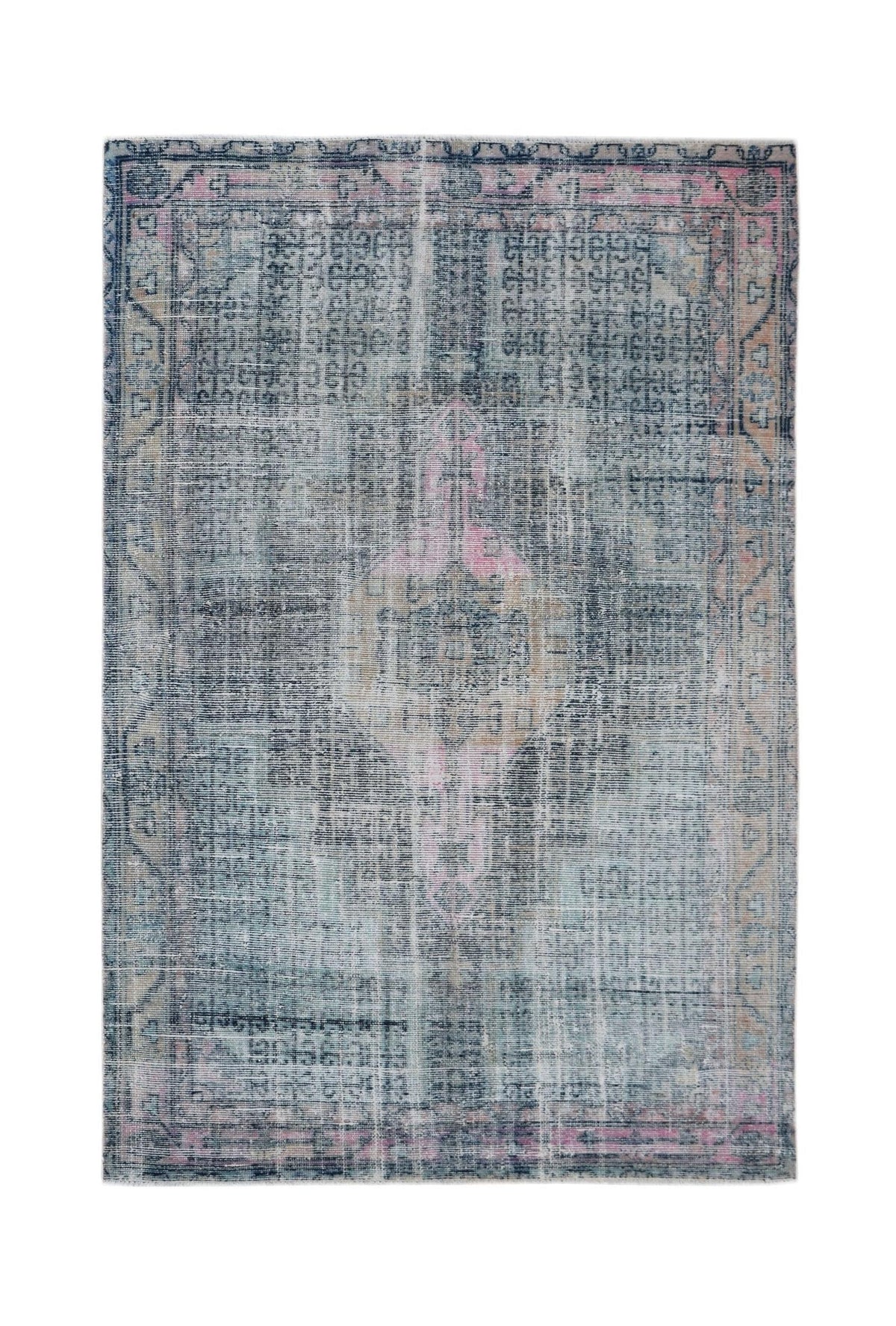 Vintage Persian Mazlaghan rug with a faded blue and pink geometric medallion pattern on a hand-knotted wool pile.