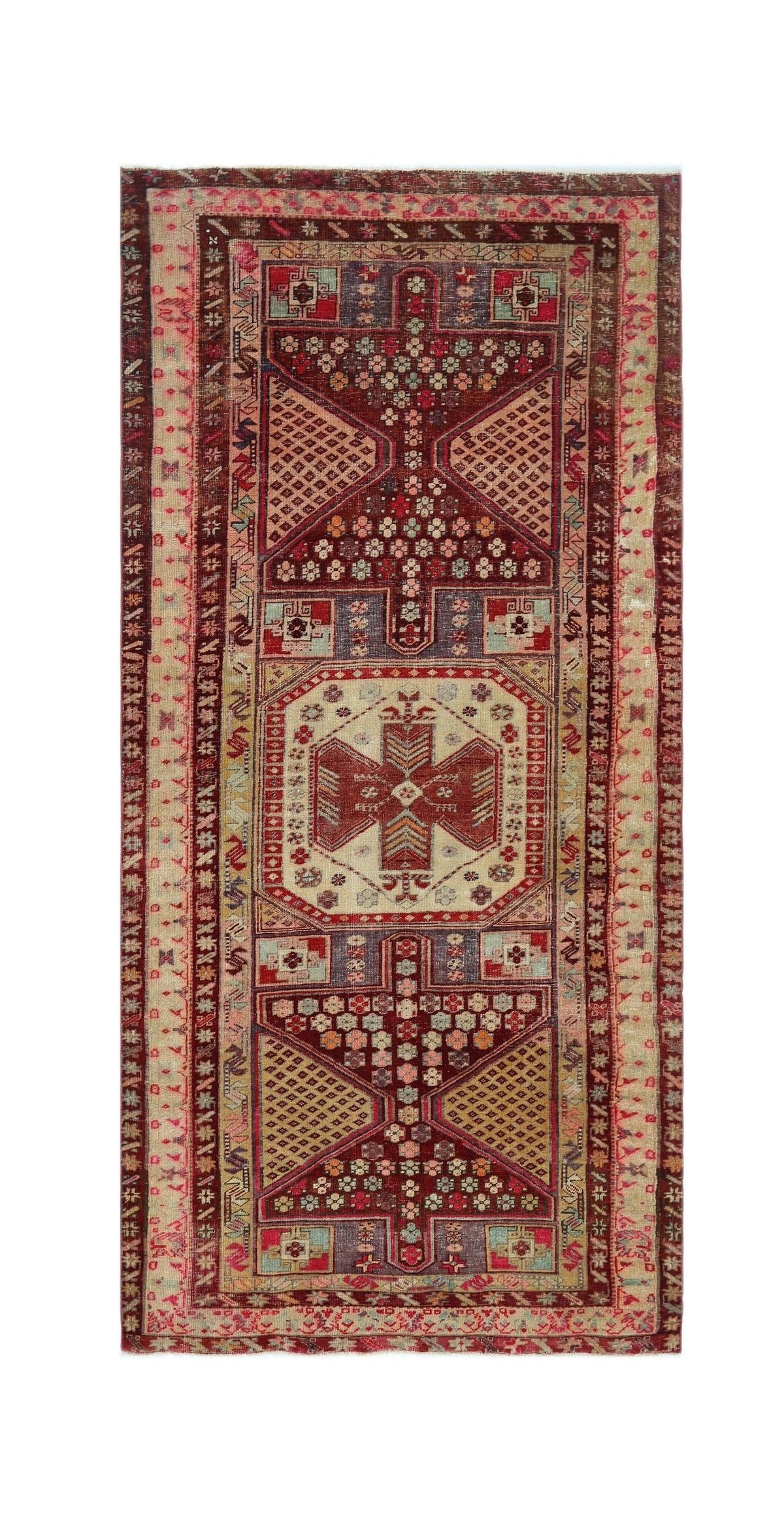 Vintage Persian Meshkin rug featuring a central medallion and geometric patterns in deep red, indigo, and earthy tones.
