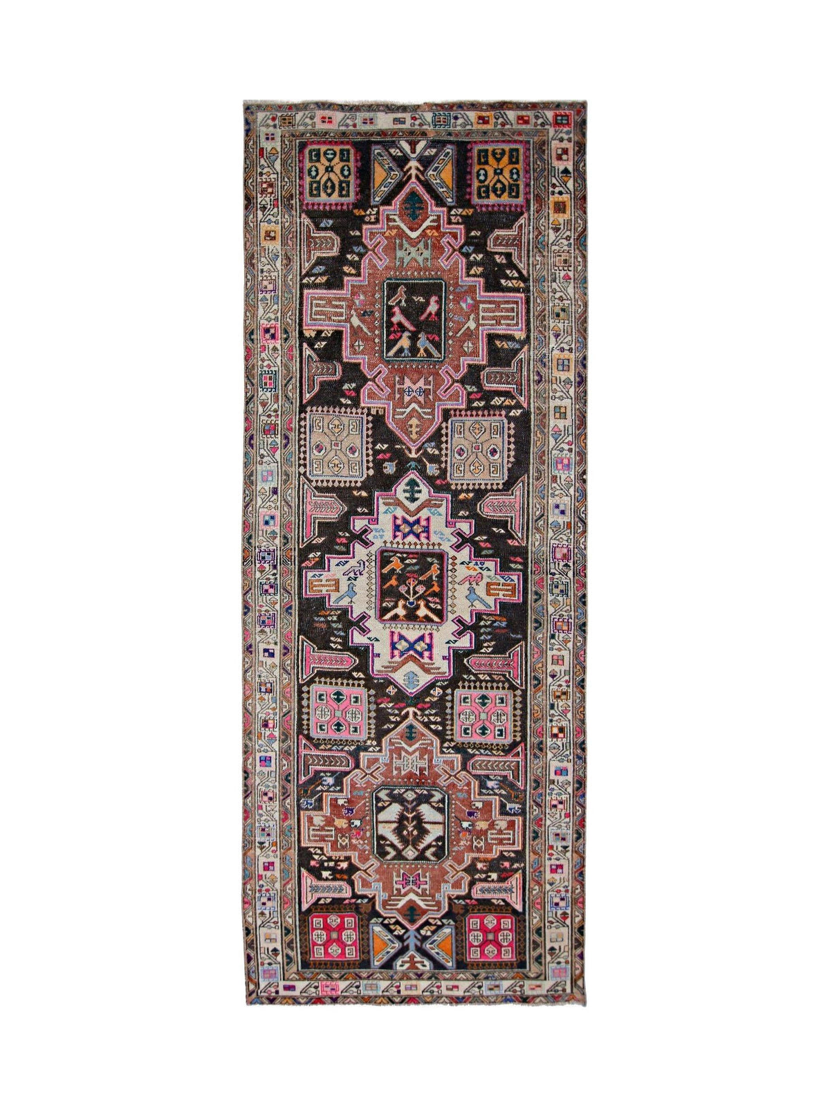 Vintage Persian Meshkin runner featuring geometric medallions and colourful village motifs on a dark field.