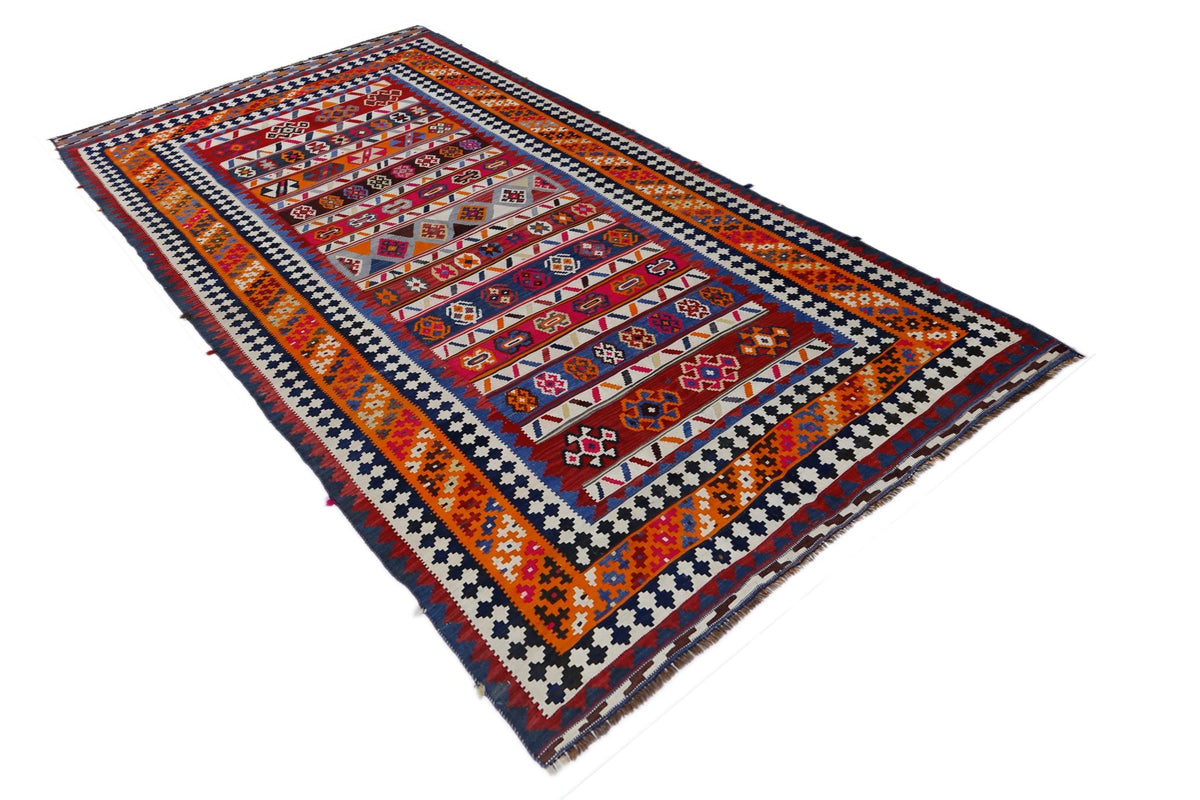 Handwoven Persian Qashqai kilim with vibrant geometric patterns in red, orange, and blue on a white background.